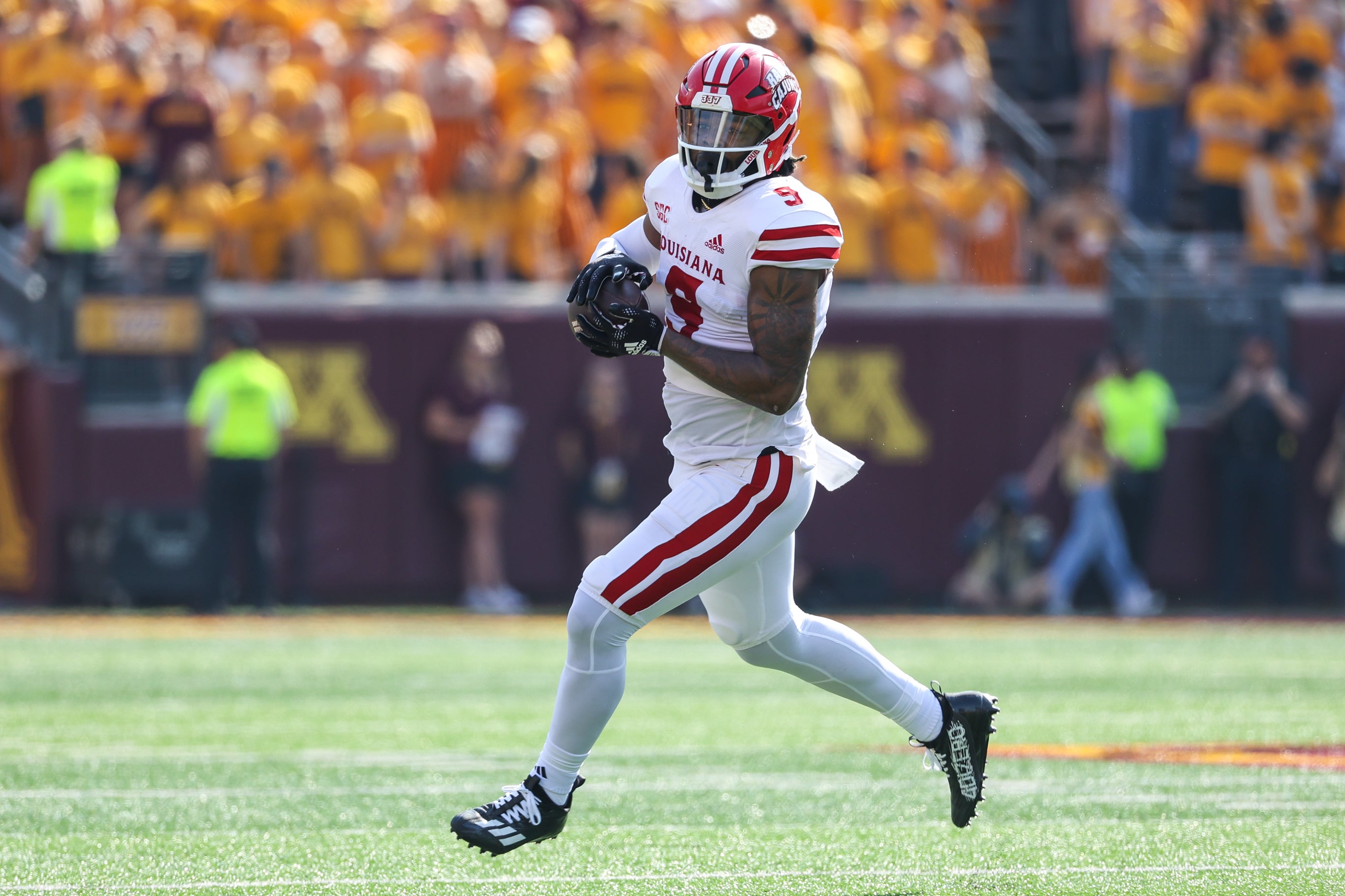Sep 30, 2023; Minneapolis, Minnesota, USA; Louisiana-Lafayette Ragin Cajuns tight end Neal Johnson (9) catches a pass during the first quarter against the Minnesota Golden Gophers at Huntington Bank Stadium.