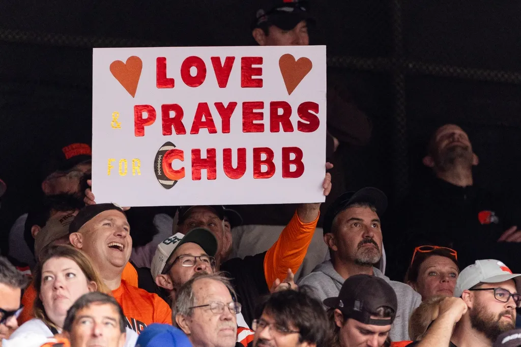 A Cleveland Browns holds up a sign for injured running back Nick Chubb (24) during the third quarter against the Tennessee Titans at Cleveland Browns Stadium. Chubb is out for the remainder of the sea...