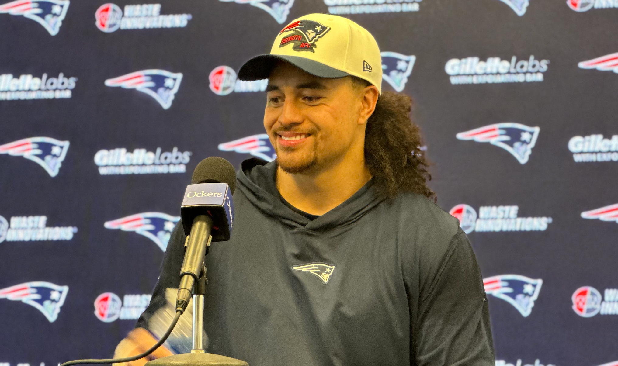 New Patriots LB Sione Takitaki speaks with the media at Gillette Stadium on Thursday.