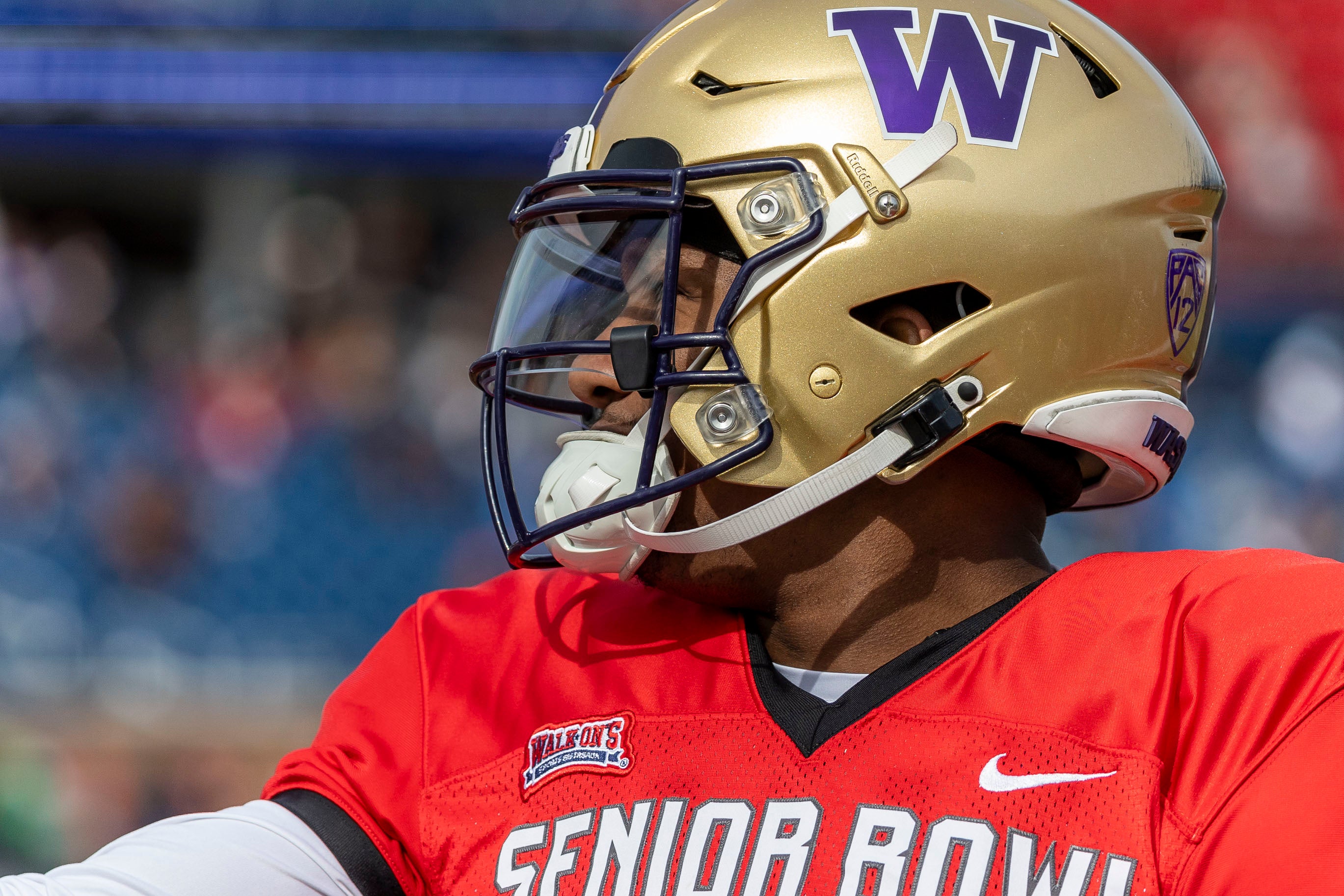 Feb 1, 2024; Mobile, AL, USA; National quarterback Michael Penix Jr of Washington (9) talks with coaches during practice for the National team at Hancock Whitney Stadium. Mandatory Credit: Vasha Hunt-USA TODAY Sports