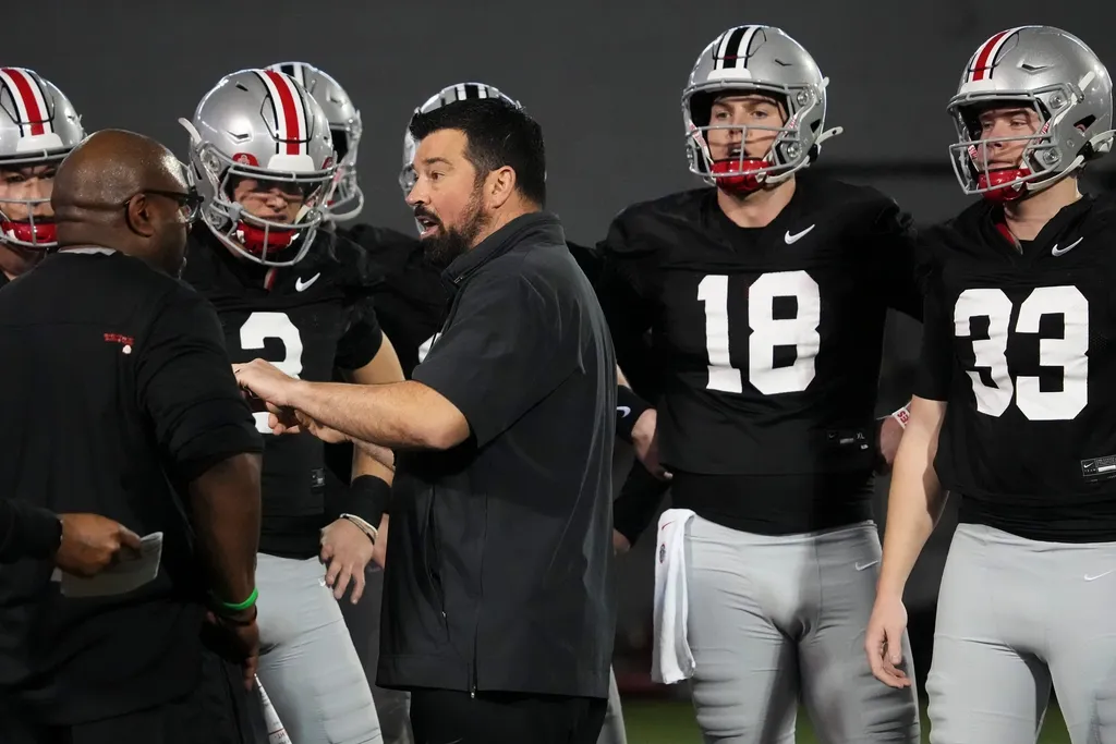 Ohio State Buckeyes head coach Ryan Day talks to quarterbacks during spring football practice at the Woody Hayes Athletic Center