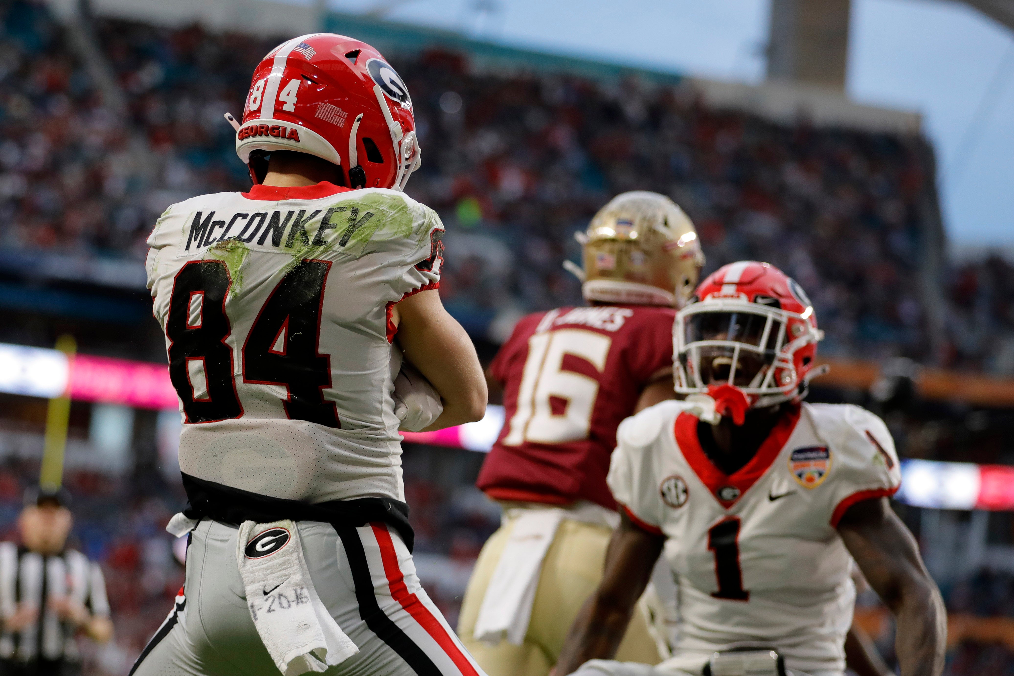 Dec 30, 2023; Miami Gardens, FL, USA; Georgia Bulldogs wide receiver Ladd McConkey (84) reacts after scoring a touchdown against the Florida State Seminoles during the first half in the 2023 Orange Bowl at Hard Rock Stadium. Mandatory Credit: Sam Navarro-USA TODAY Sports