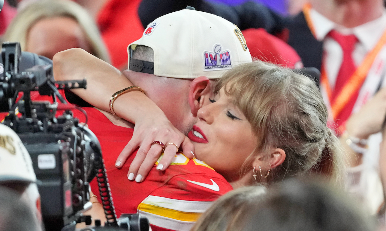 Feb 11, 2024; Paradise, Nevada, USA; Kansas City Chiefs tight end Travis Kelce (87) hugs recording artist Taylor Swift after winning Super Bowl LVIII against the San Francisco 49ers at Allegiant Stadium