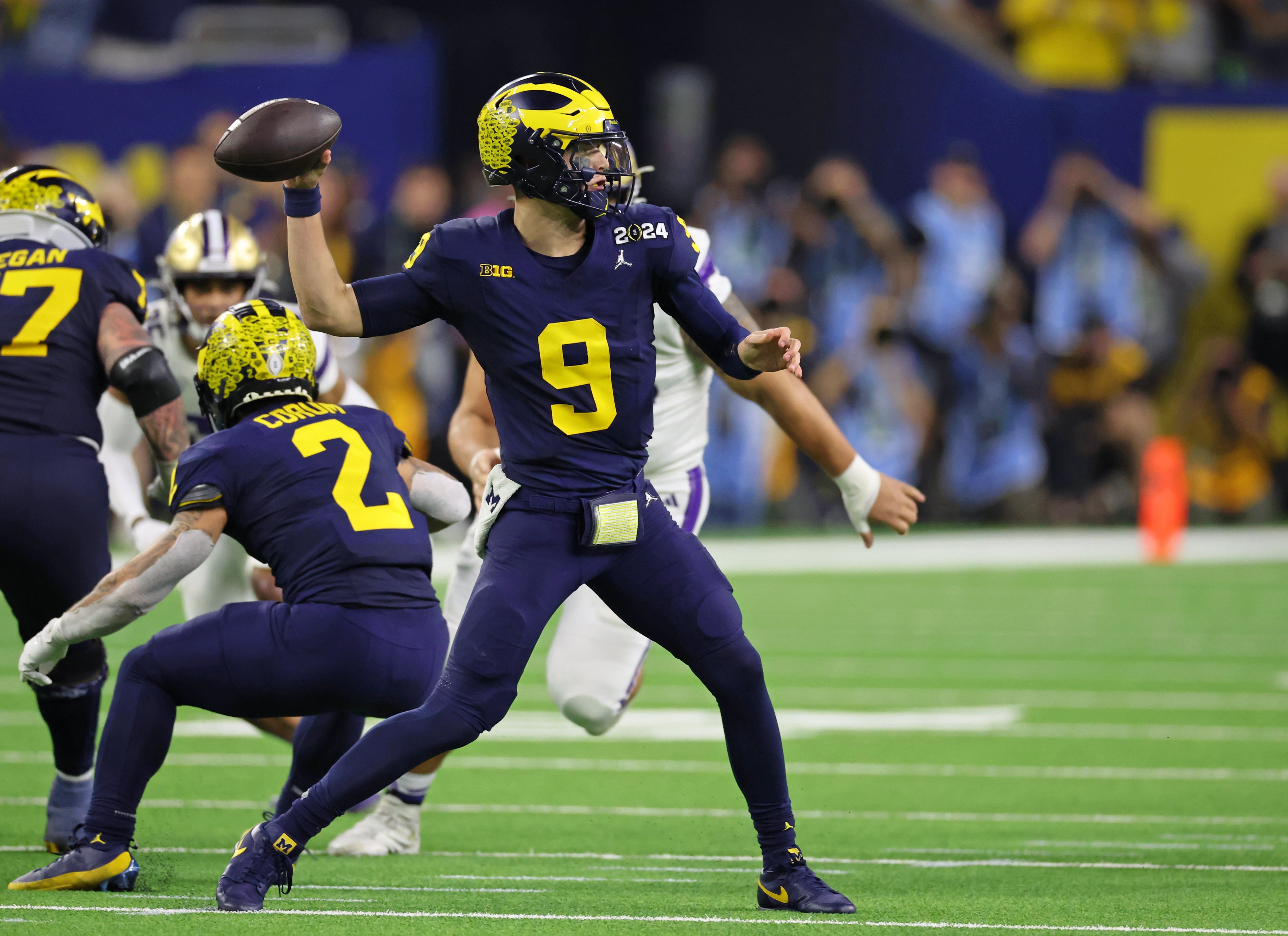 Jan 8, 2024; Houston, TX, USA; Michigan Wolverines quarterback J.J. McCarthy (9) passes the ball against the Washington Huskies during the third quarter in the 2024 College Football Playoff national championship game at NRG Stadium