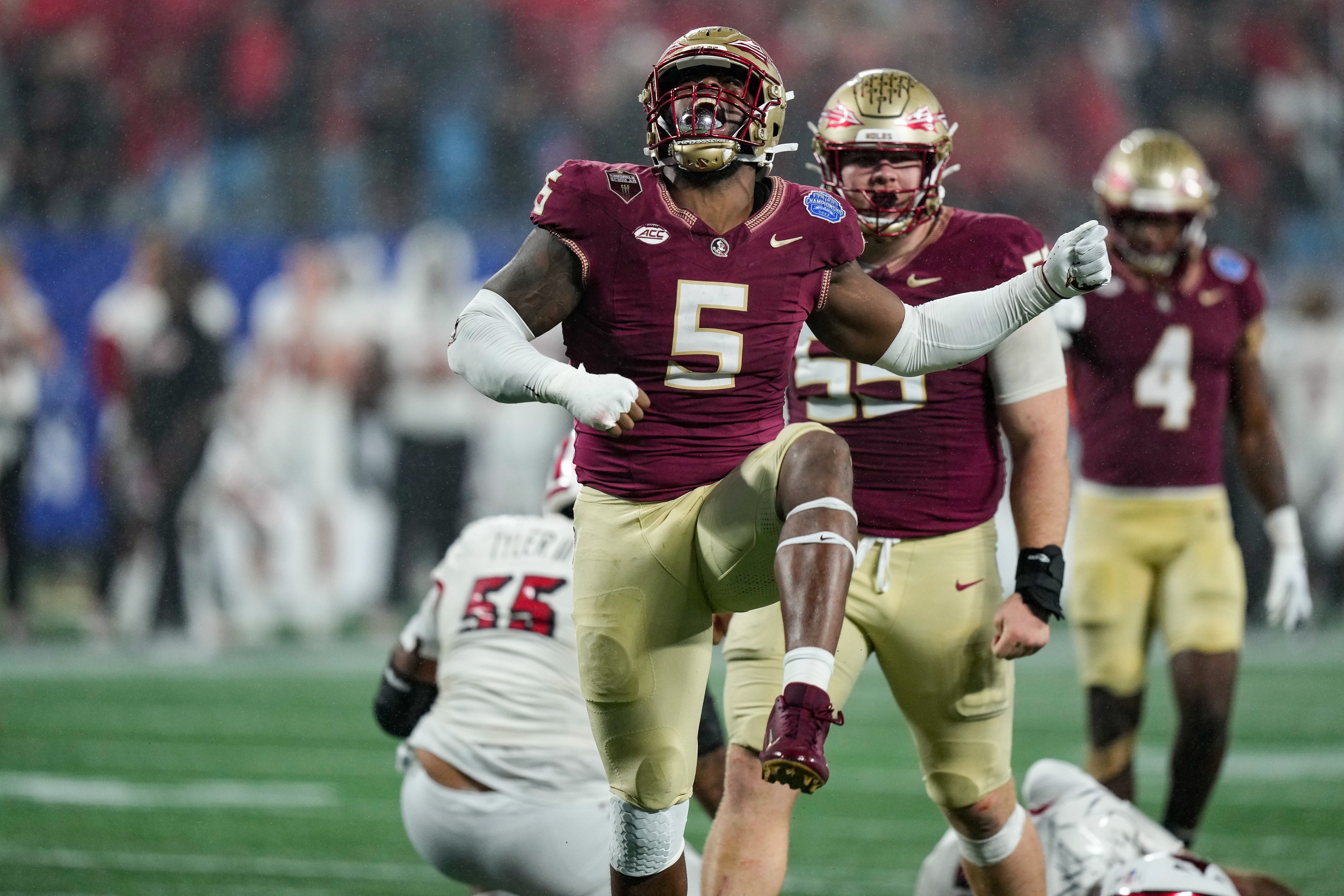 Dec 2, 2023; Charlotte, NC, USA; Florida State Seminoles defensive lineman Jared Verse (5) reacts during the fourth quarter against the Louisville Cardinals at Bank of America Stadium.