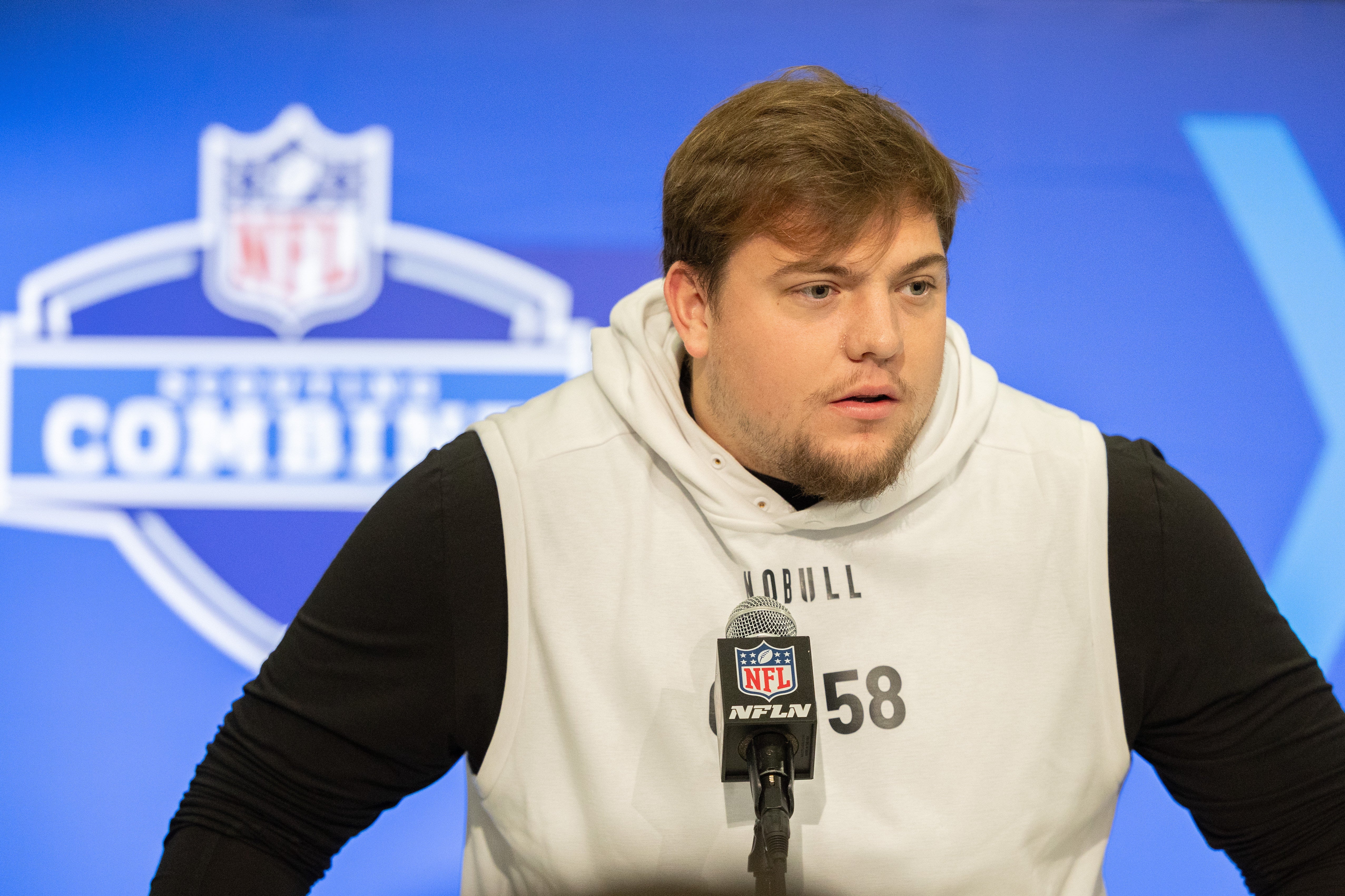 Mar 2, 2024; Indianapolis, IN, USA; Oregon offensive lineman Jackson Powers-Johnson (OL58) talks to the media during the 2024 NFL Combine at Lucas Oil Stadium.
