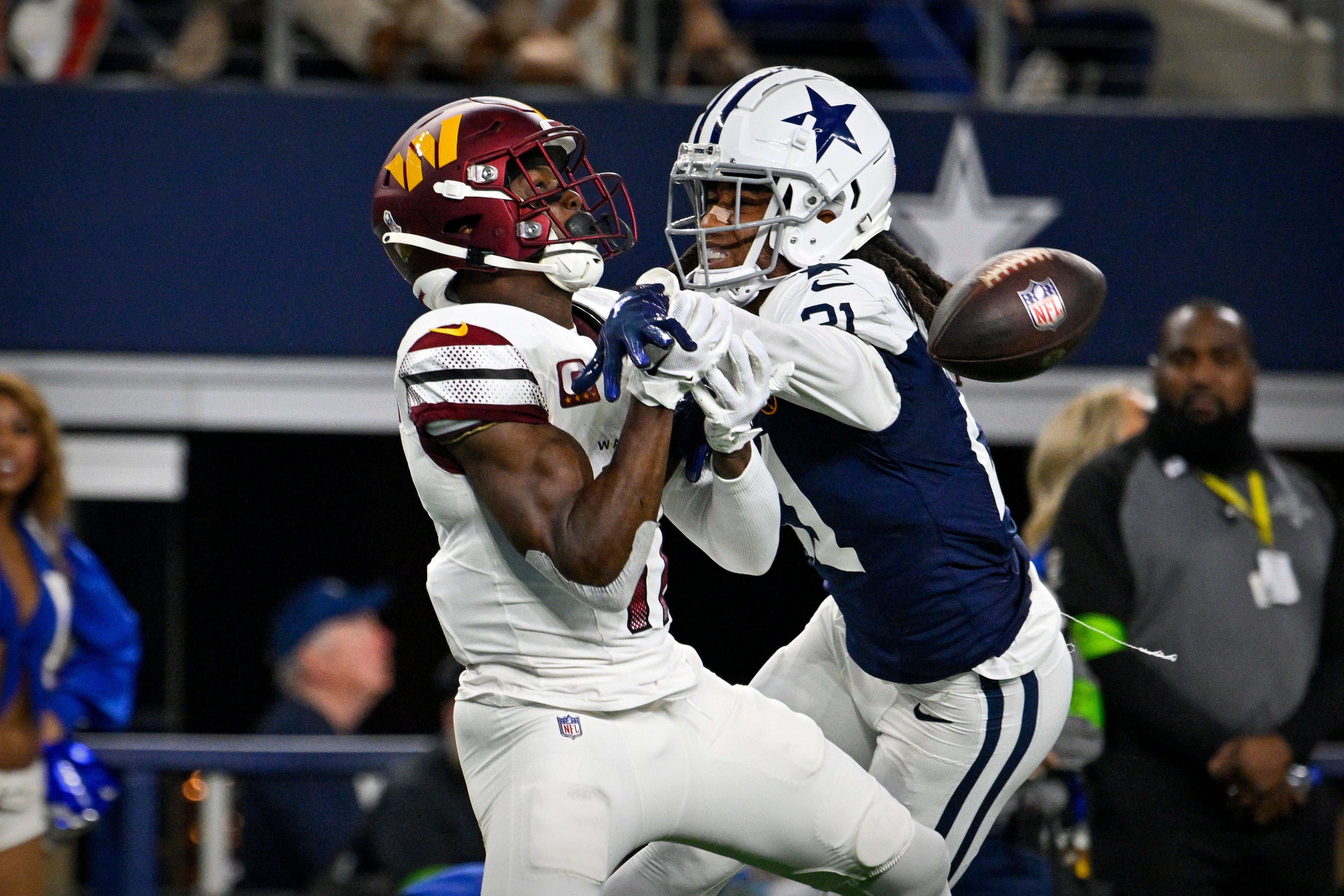 Dallas Cowboys cornerback Stephon Gilmore (21) breaks up a pass intended for Washington Commanders wide receiver Terry McLaurin (17) during the second half at AT&T Stadium.