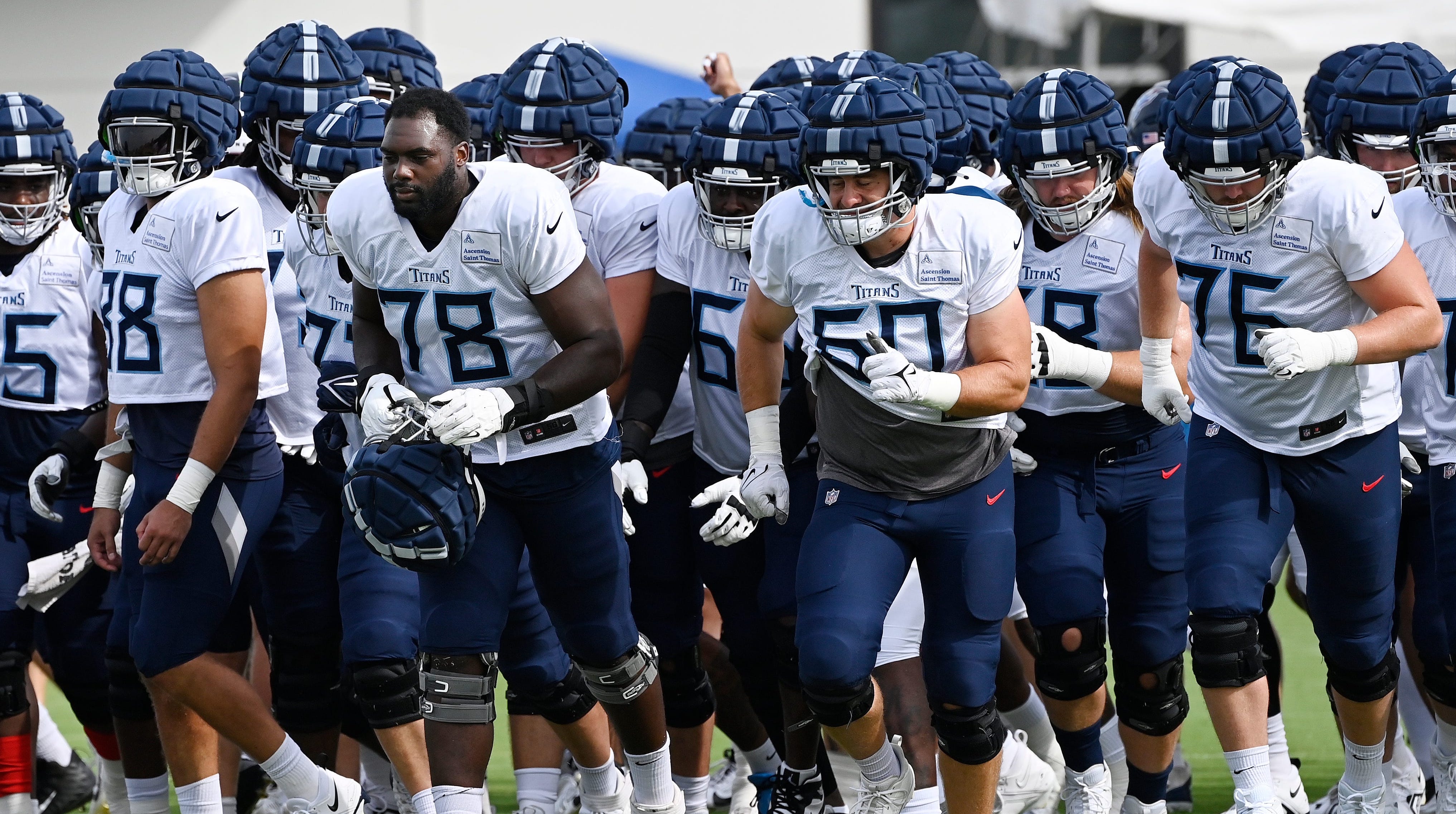 Tennessee Titans offensive tackle Nicholas Petit-Frere (78) runs to the first drill with teammates during an NFL football training camp practice Tuesday, August 8, 2023, in Nashville, Tenn Mark Zaleski / The Tennessean-USA TODAY NETWORK