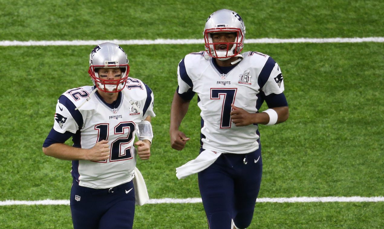Feb 5, 2017; Houston, TX, USA; New England Patriots quarterback Tom Brady (12) leads teammates onto the field before Super Bowl LI at NRG Stadium. At left is New England Patriots quarterback Jimmy Garoppolo (10) and New England Patriots quarterback Jacoby Brissett (7)