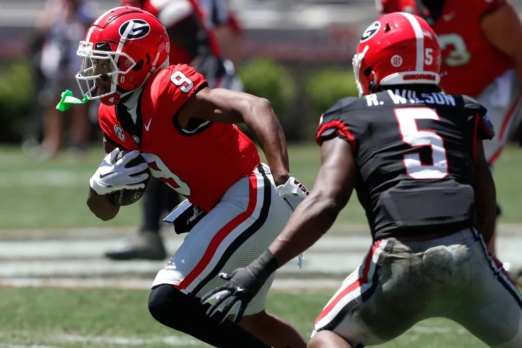 Georgia wide receiver Tara Thomas (9) moves the ball down the field during the G-Day spring football game in Athens, Ga., on Saturday, April 13, 2024.