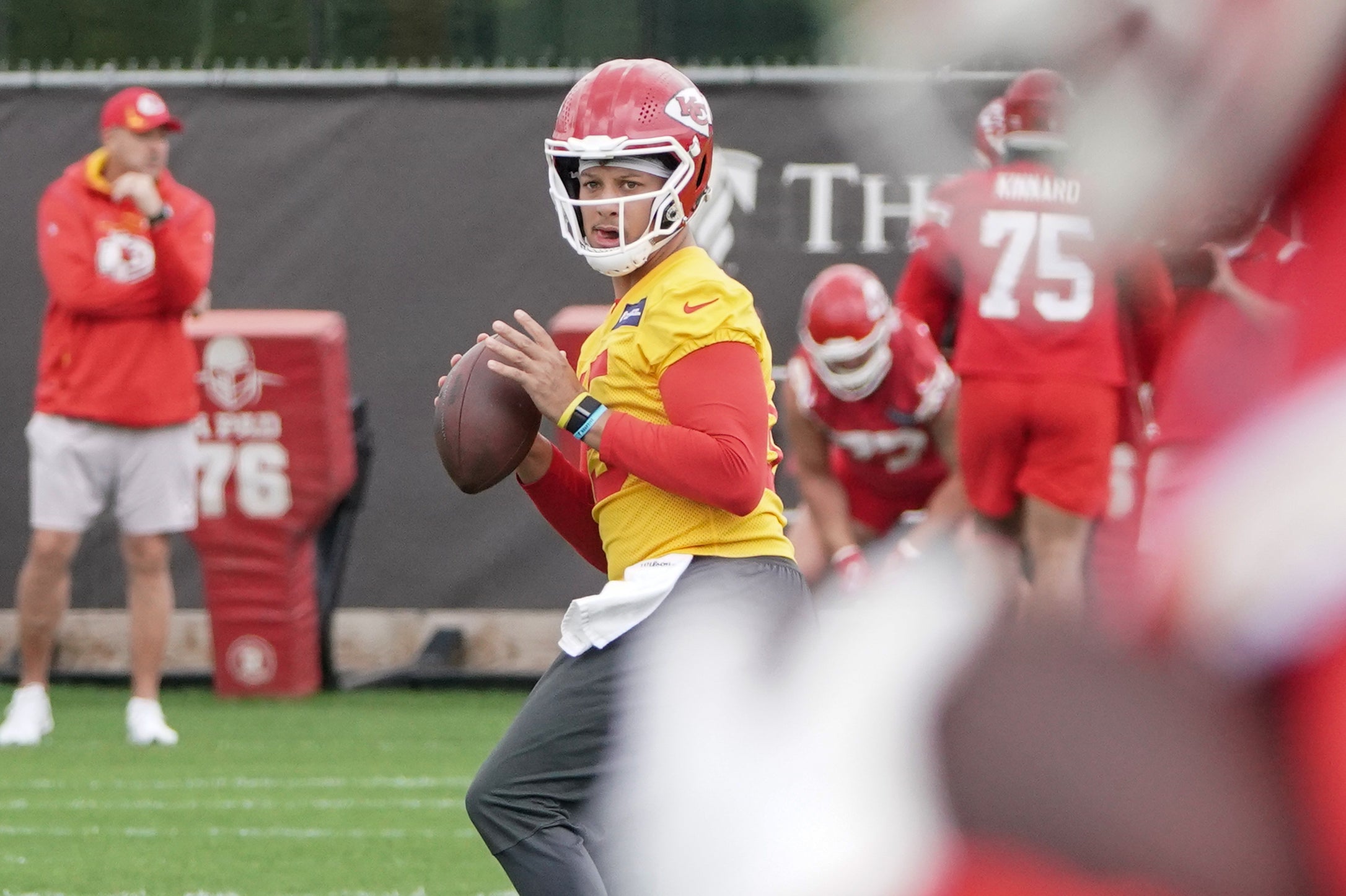 May 26, 2022; Kansas City, MO, USA; Kansas City Chiefs quarterback Patrick Mahomes (15) drops back to pass during organized team activities at The University of Kansas Health System Training Complex.