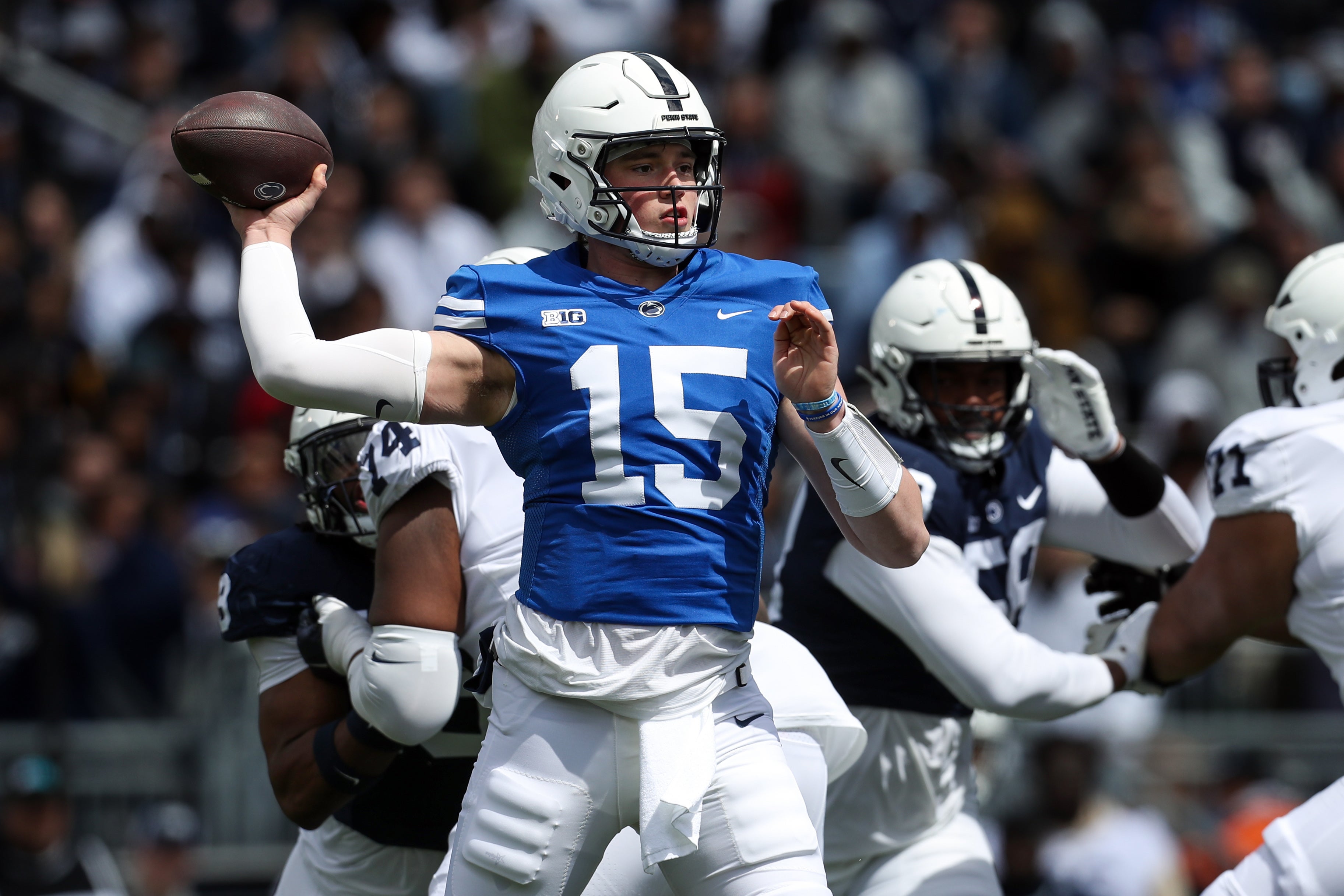 Apr 13, 2024; University Park, PA, USA; Penn State Nittany Lions quarterback Drew Allar (15) throws a pass during the first quarter of the Blue White spring game at Beaver Stadium. The White team defeated the Blue team 27-0.