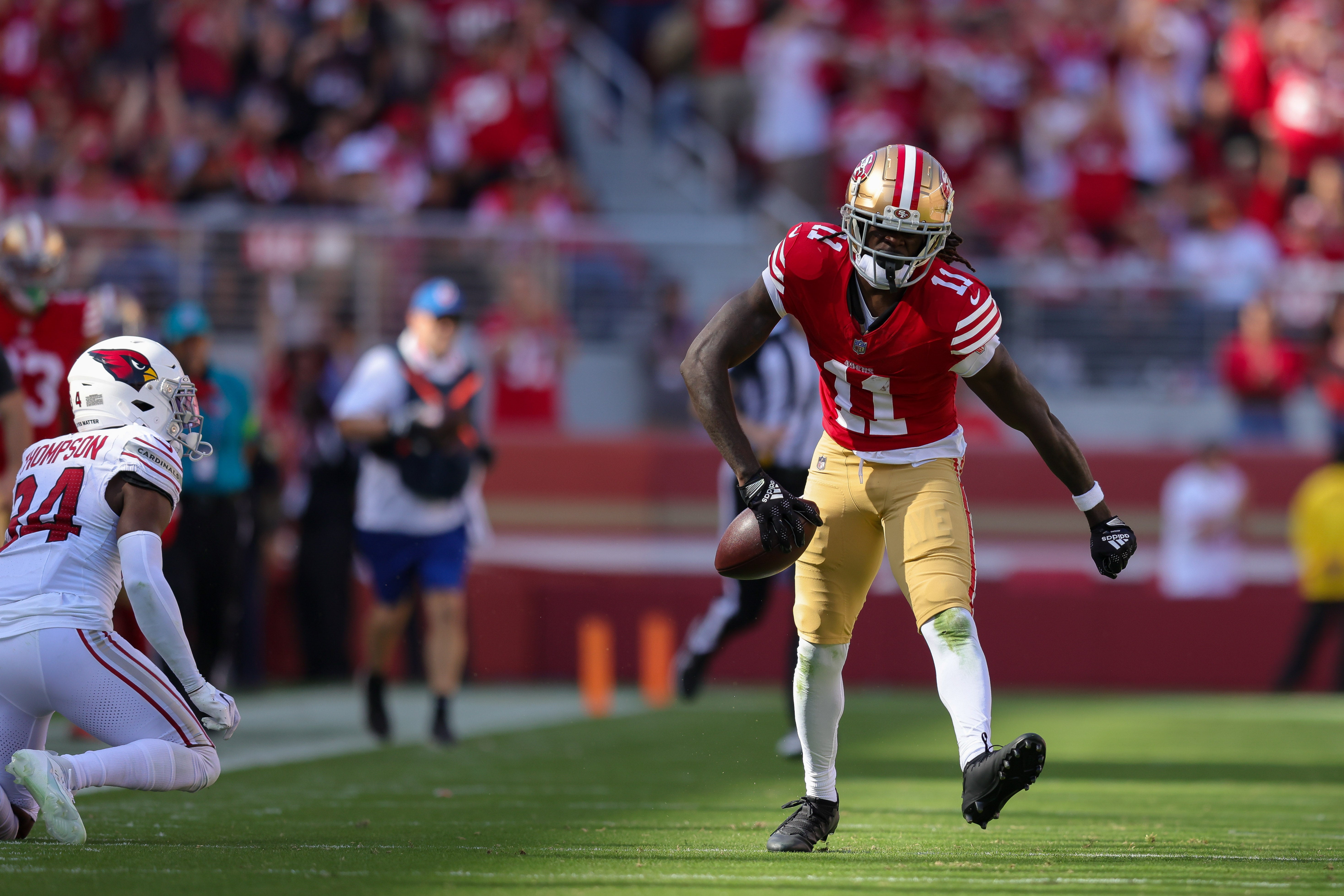 Oct 1, 2023; Santa Clara, California, USA; San Francisco 49ers wide receiver Brandon Aiyuk (11) celebrates after a play during the third quarter against the Arizona Cardinals at Levi's Stadium.