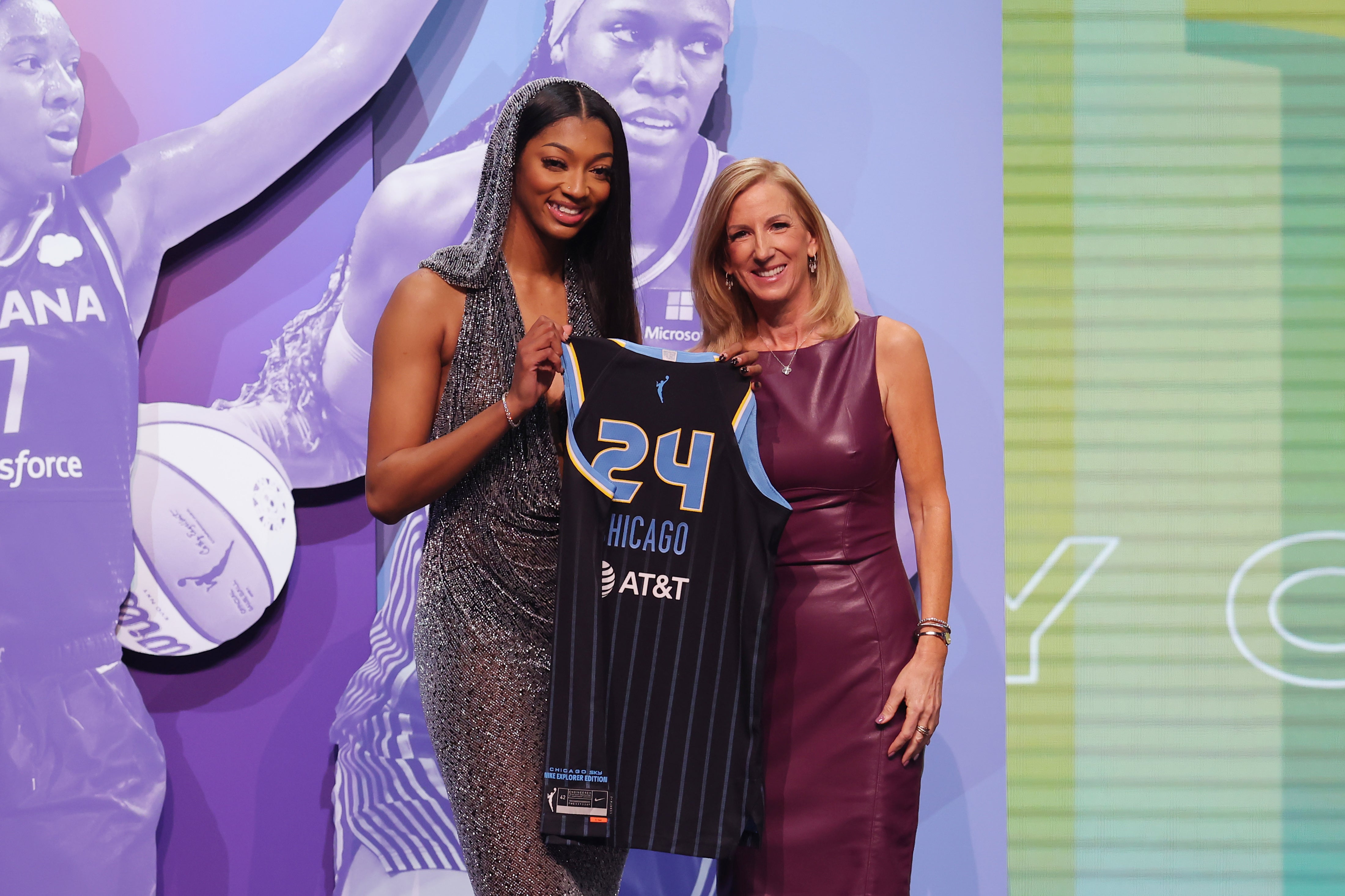 Apr 15, 2024; Brooklyn, NY, USA; Angel Reese poses with WNBA commissioner Cathy Engelbert after she is selected with the number seven overall pick to the Chicago Sky n the 2024 WNBA Draft at Brooklyn Academy of Music.