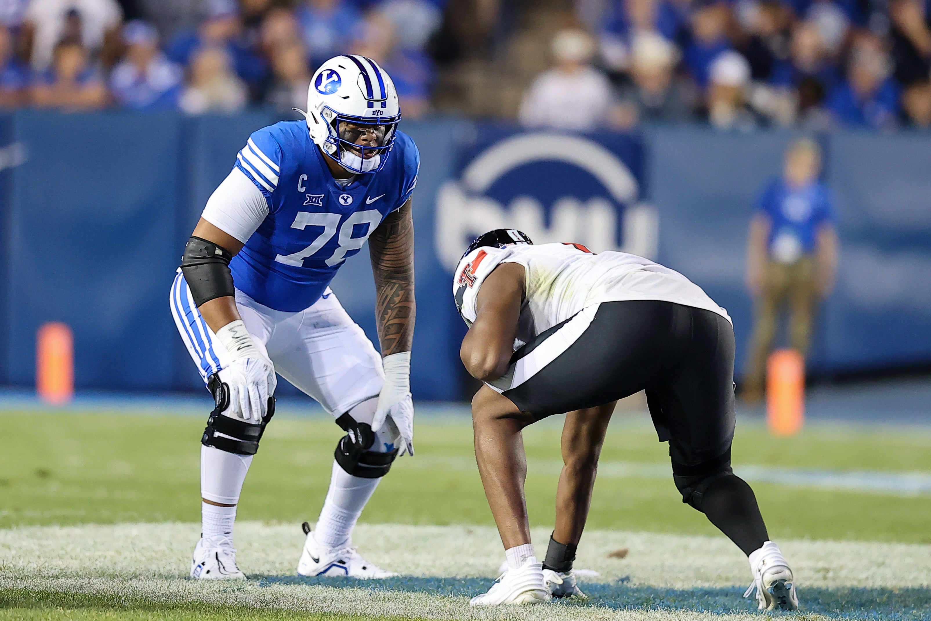 Oct 21, 2023; Provo, Utah, USA; Brigham Young Cougars offensive lineman Kingsley Suamataia (78) against Texas Tech Red Raiders linebacker Myles Cole (6) in there first half at LaVell Edwards Stadium.