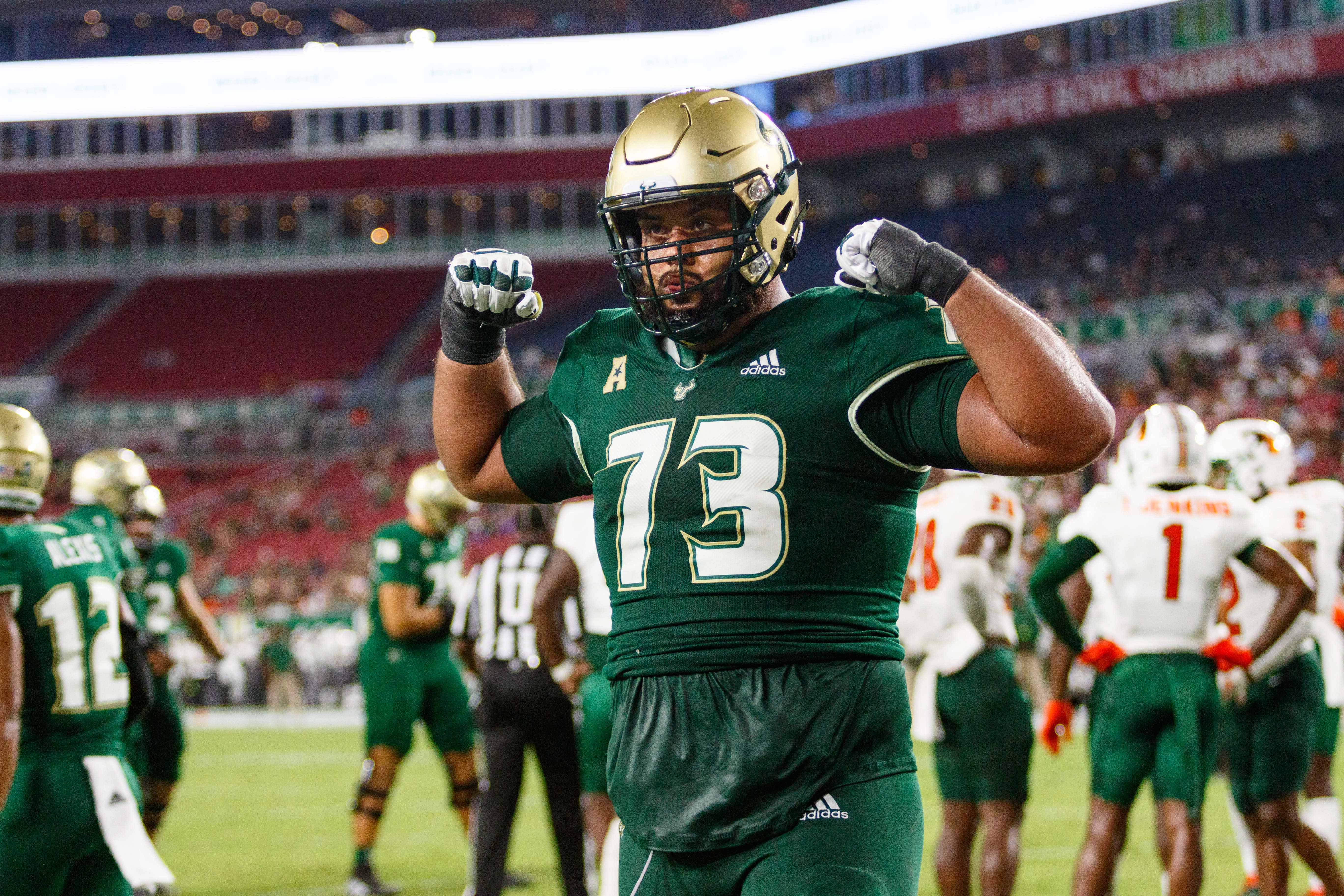 Sep 9, 2023; Tampa, Florida, USA; South Florida Bulls offensive line Donovan Jennings (73) celebrates a touchdown against Florida A&M Rattlers during the second quarter at Raymond James Stadium.