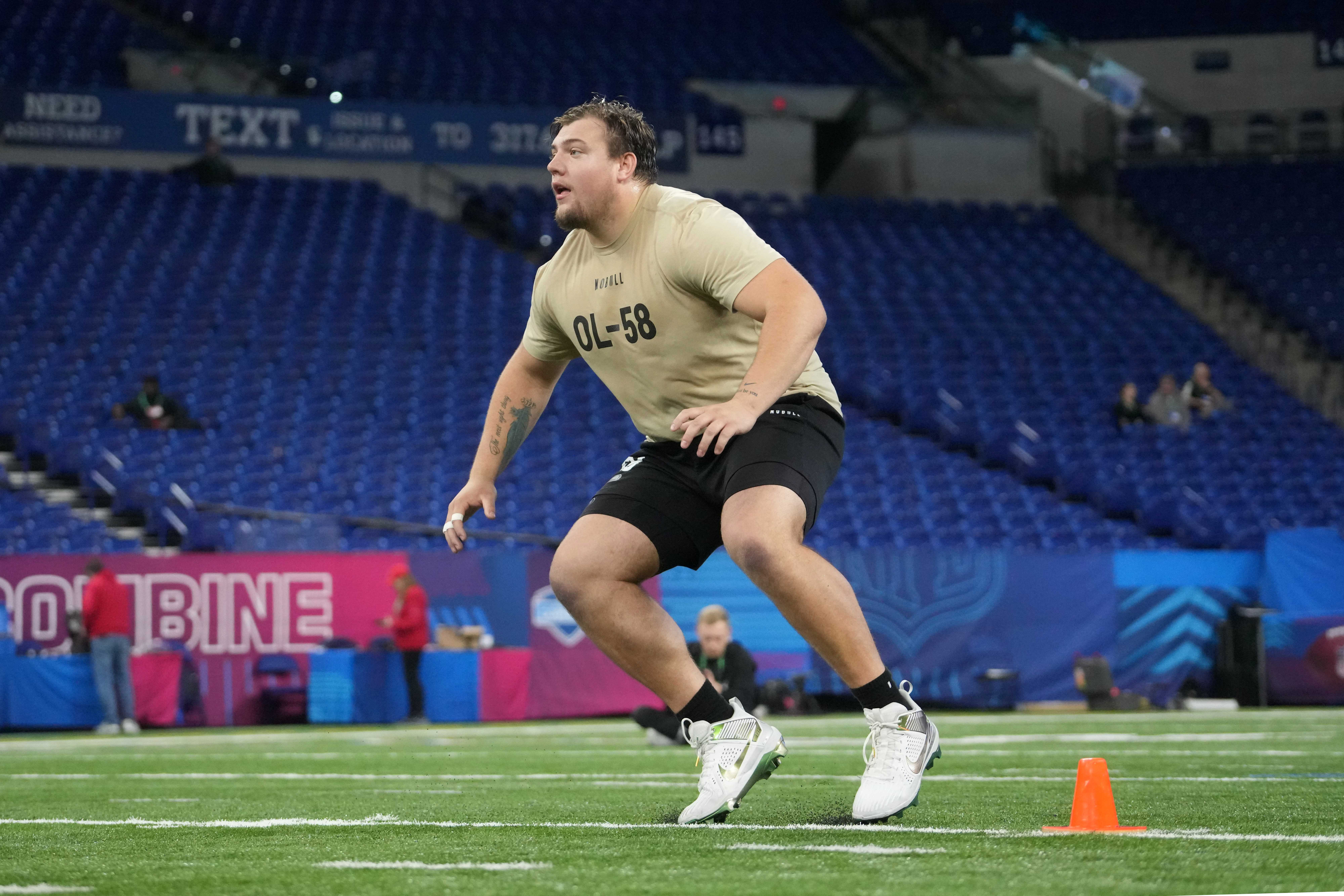 Mar 3, 2024; Indianapolis, IN, USA; Oregon offensive lineman Jackson Powers-Johnson (OL58) during the 2024 NFL Scouting Combine at Lucas Oil Stadium.