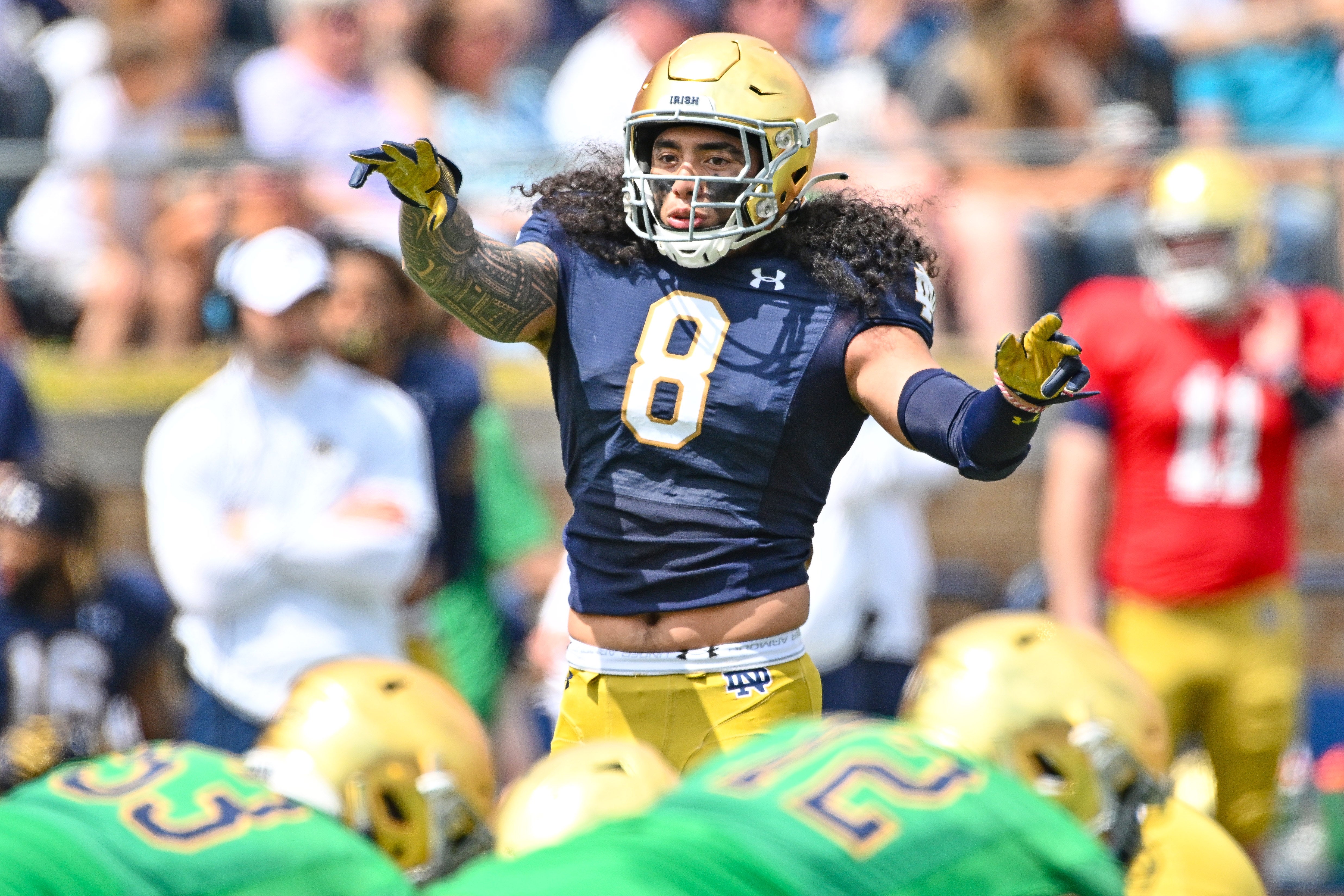 Apr 23, 2022; Notre Dame, Indiana, USA; Notre Dame Fighting Irish linebacker Marist Liufau (8) signals to his teammates in the second quarter of the Blue-Gold Game at Notre Dame Stadium.
