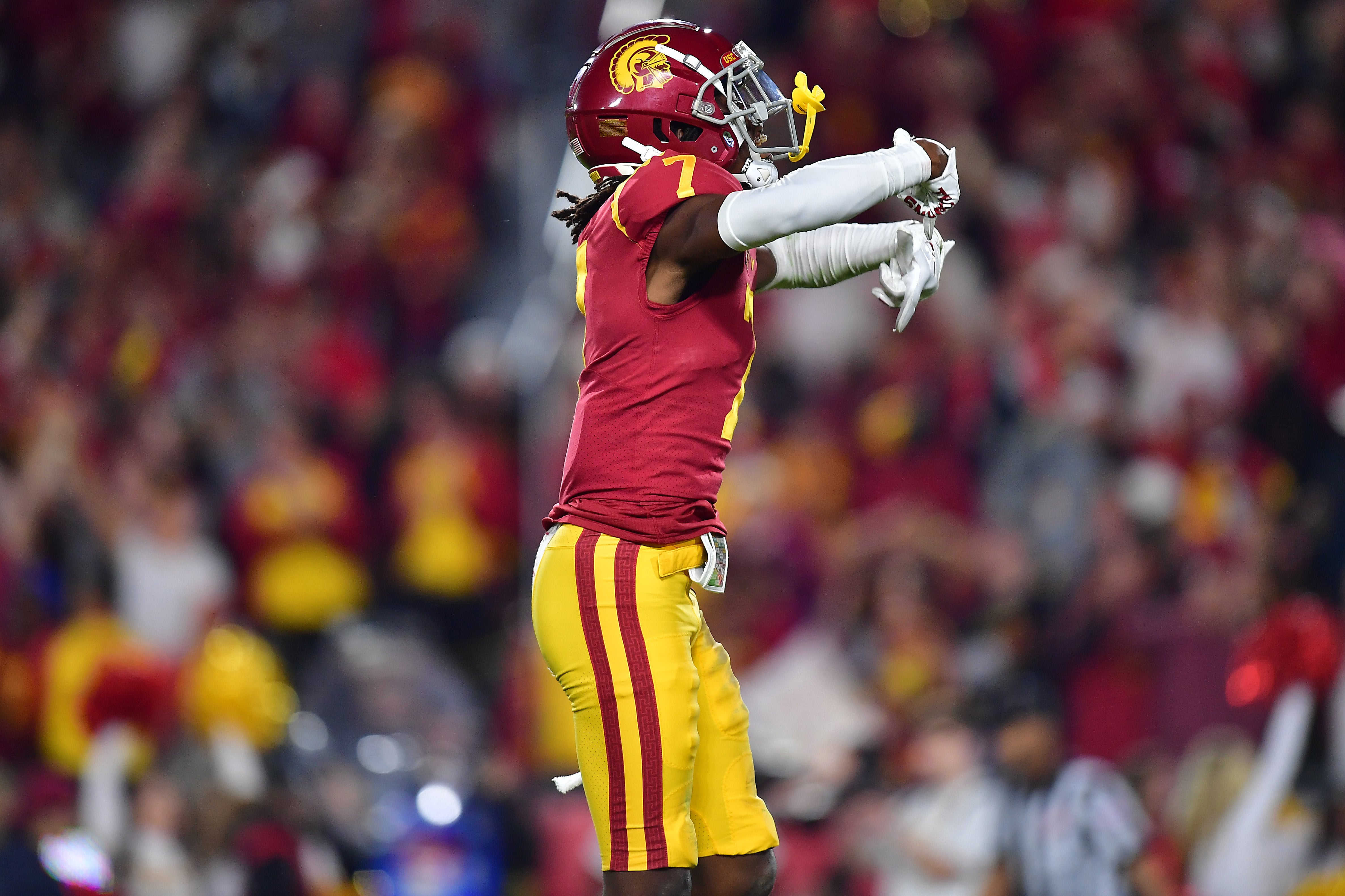 Nov 26, 2022; Los Angeles, California, USA; Southern California Trojans defensive back Calen Bullock (7) reacts after an interception against the Notre Dame Fighting Irish during the second half at the Los Angeles Memorial Coliseum.