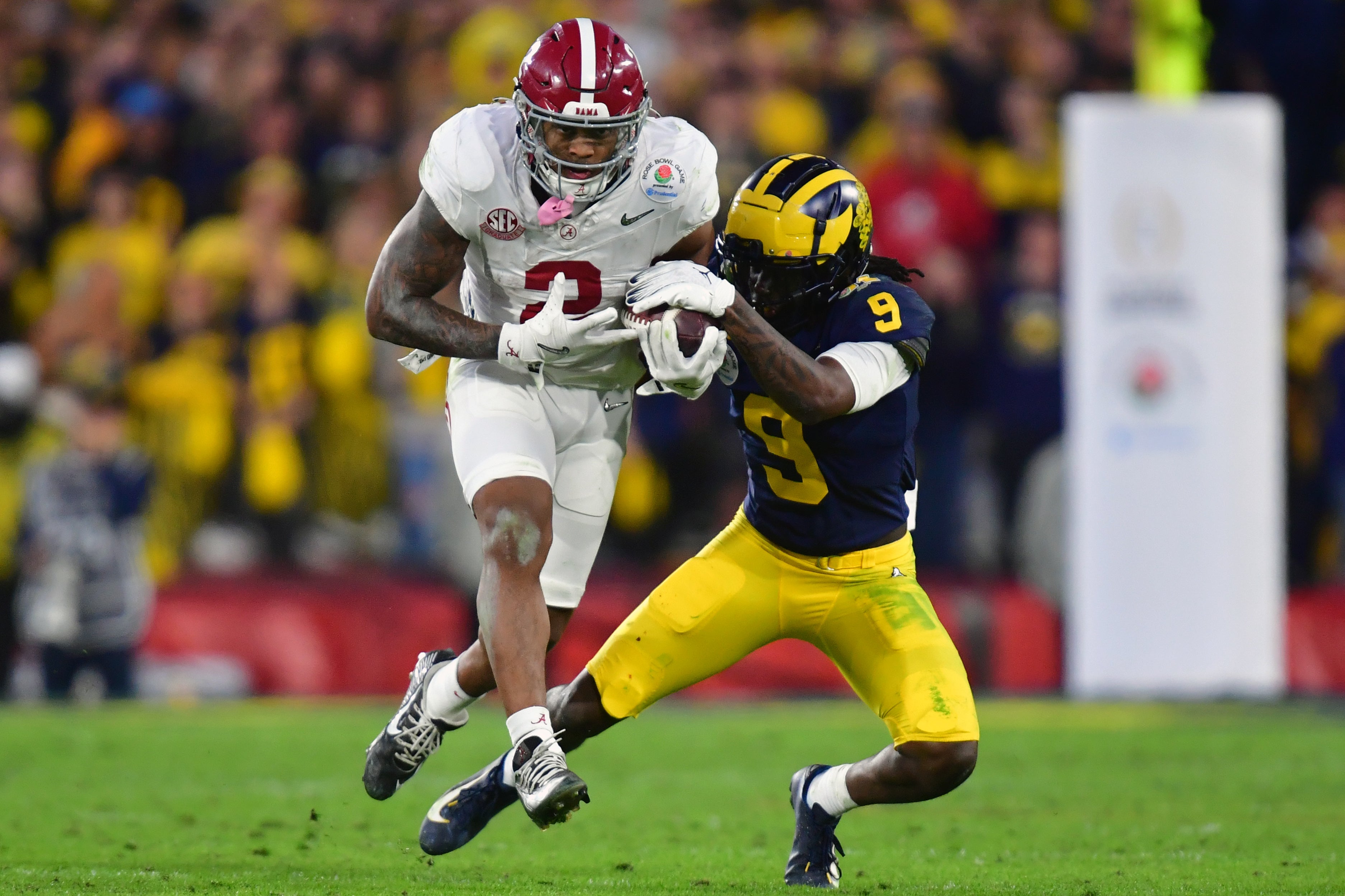 Jan 1, 2024; Pasadena, CA, USA; Alabama Crimson Tide running back Jase McClellan (2) runs against Michigan Wolverines defensive back Rod Moore (9) in the fourth quarter in the 2024 Rose Bowl college football playoff semifinal game at Rose Bowl. Mandatory Credit: Gary A. Vasquez-USA TODAY Sports