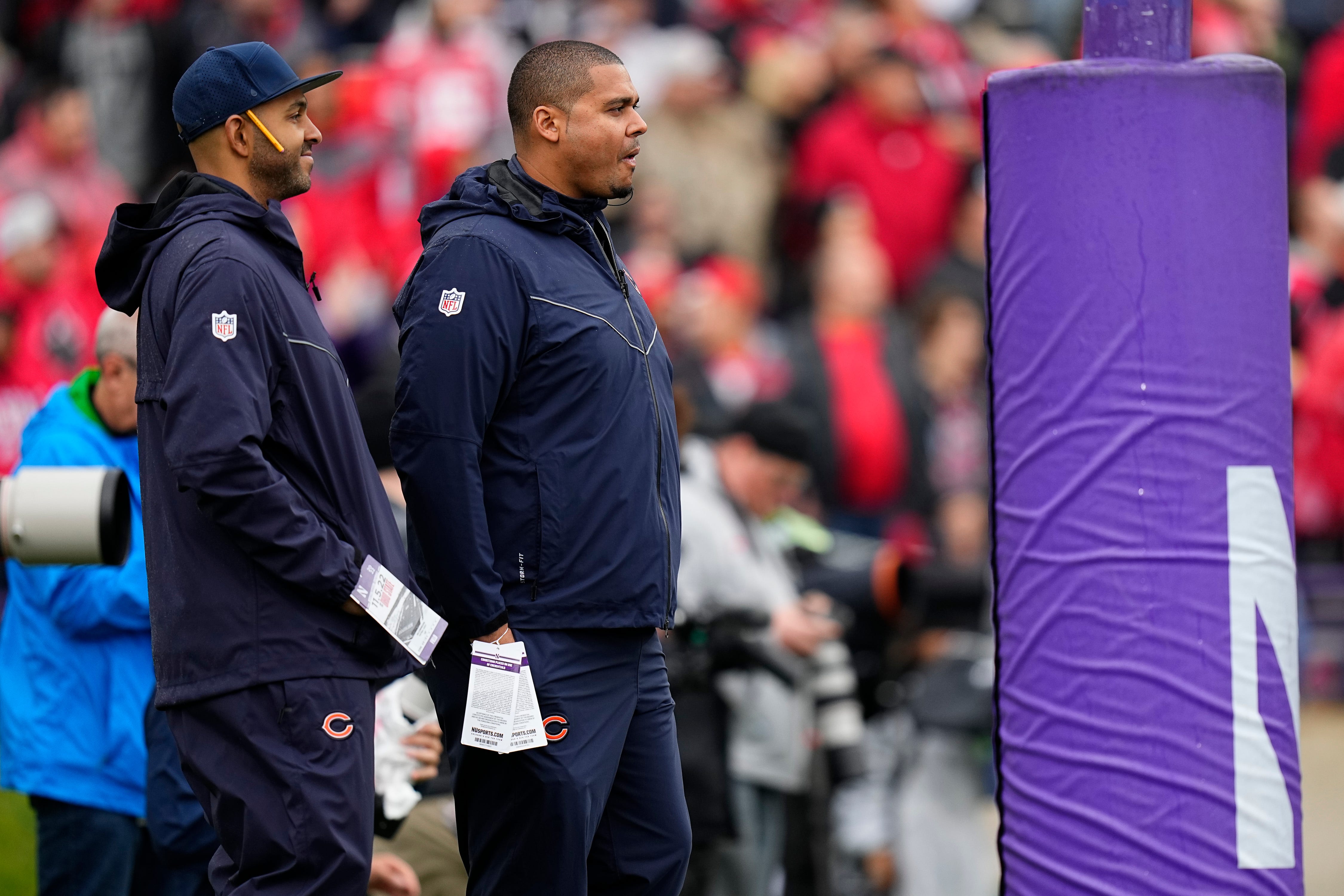 Nov 5, 2022; Evanston, Illinois, USA; Chicago Bears general manager Ryan Poles, right watches during the first half of the NCAA football game between the Northwestern Wildcats and the Ohio State Buckeyes at Ryan Field.