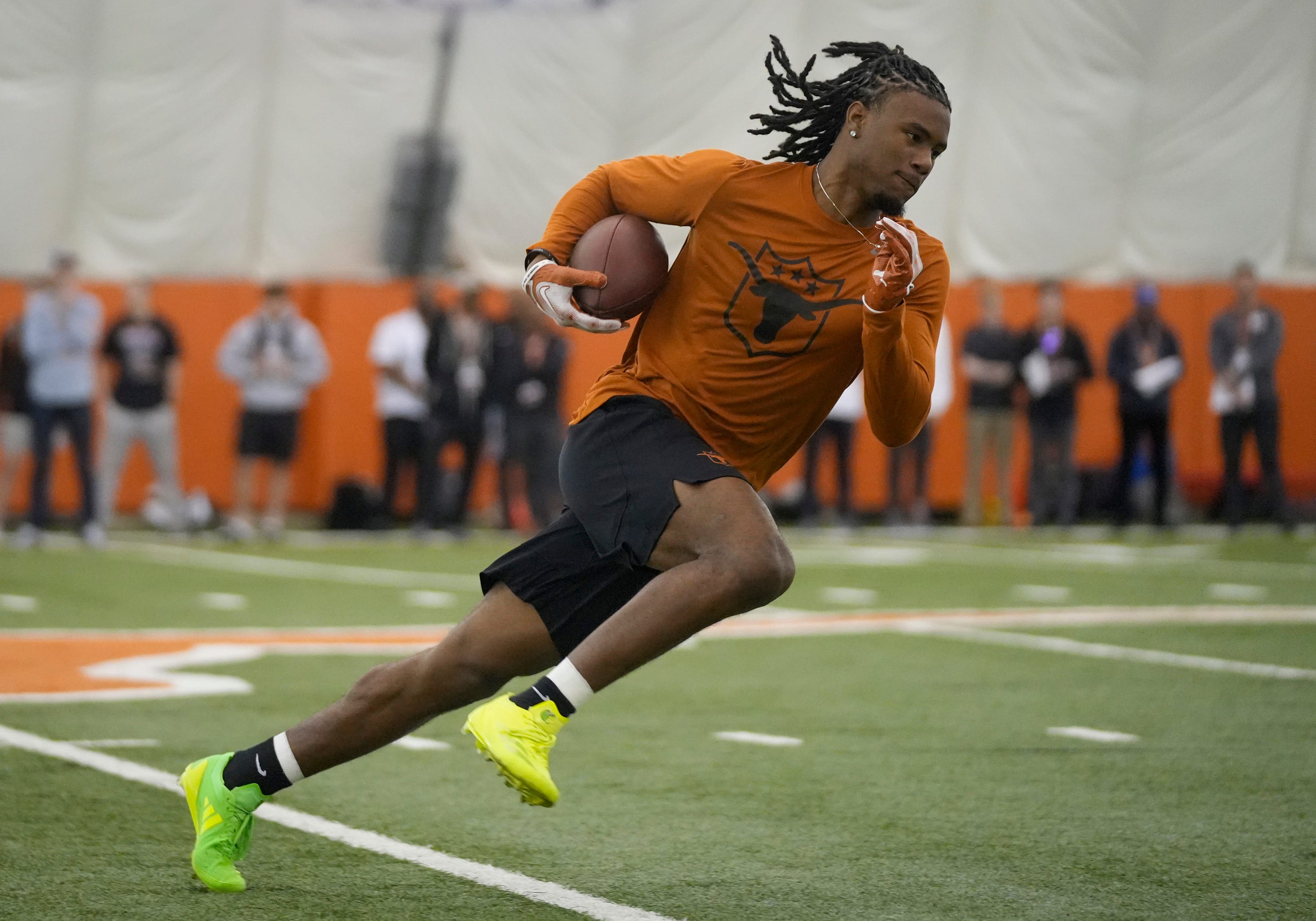 Wide receiver Adonai Mitchell goes through drills at Texas Longhorns Football Pro Day at Frank Denius Fields on Wednesday, March 20, 2024.
