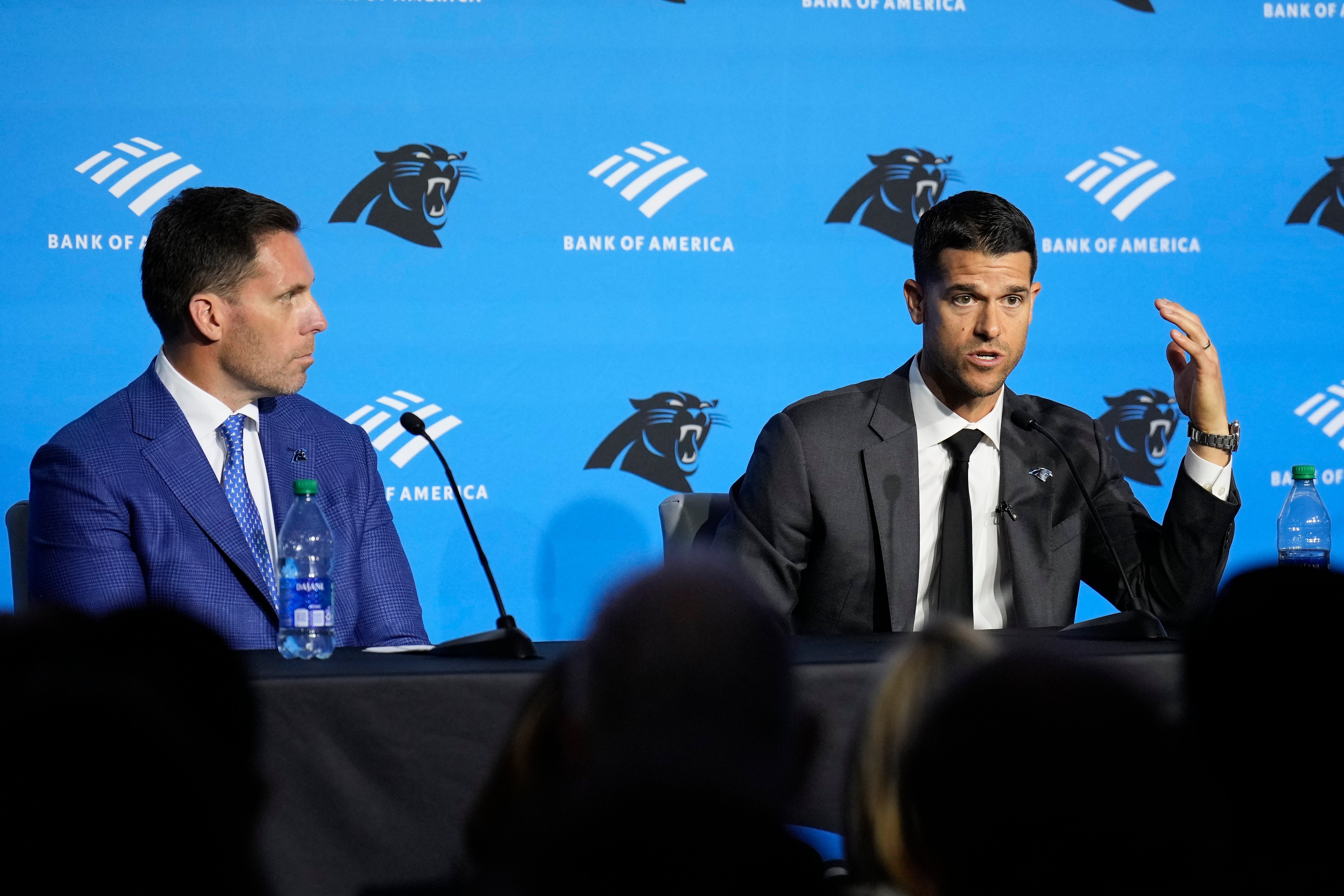 Feb 1, 2024; Charlotte, NC, USA; Carolina Panthers head coach Dave Canales speaks to the media as general manager Dan Morgan looks on during the introductory press conference at Bank of America Stadium. Mandatory Credit: Jim Dedmon-USA TODAY Sports