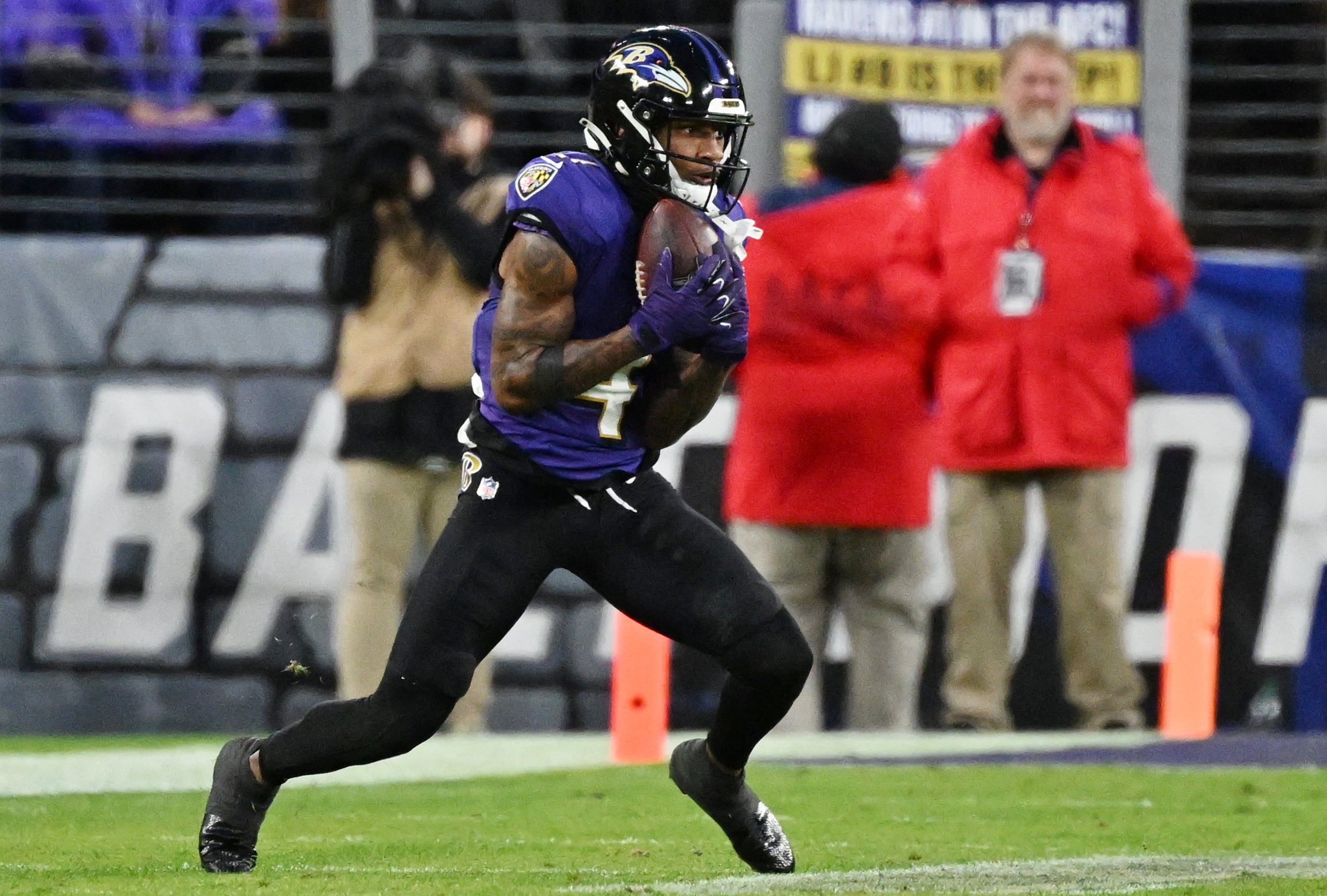  Jan 28, 2024; Baltimore, Maryland, USA; Baltimore Ravens wide receiver Zay Flowers (4) makes a catch against the Kansas City Chiefs during the second half in the AFC Championship football game at M&T Bank Stadium. Mandatory Credit: Tommy Gilligan-USA TODAY Sports