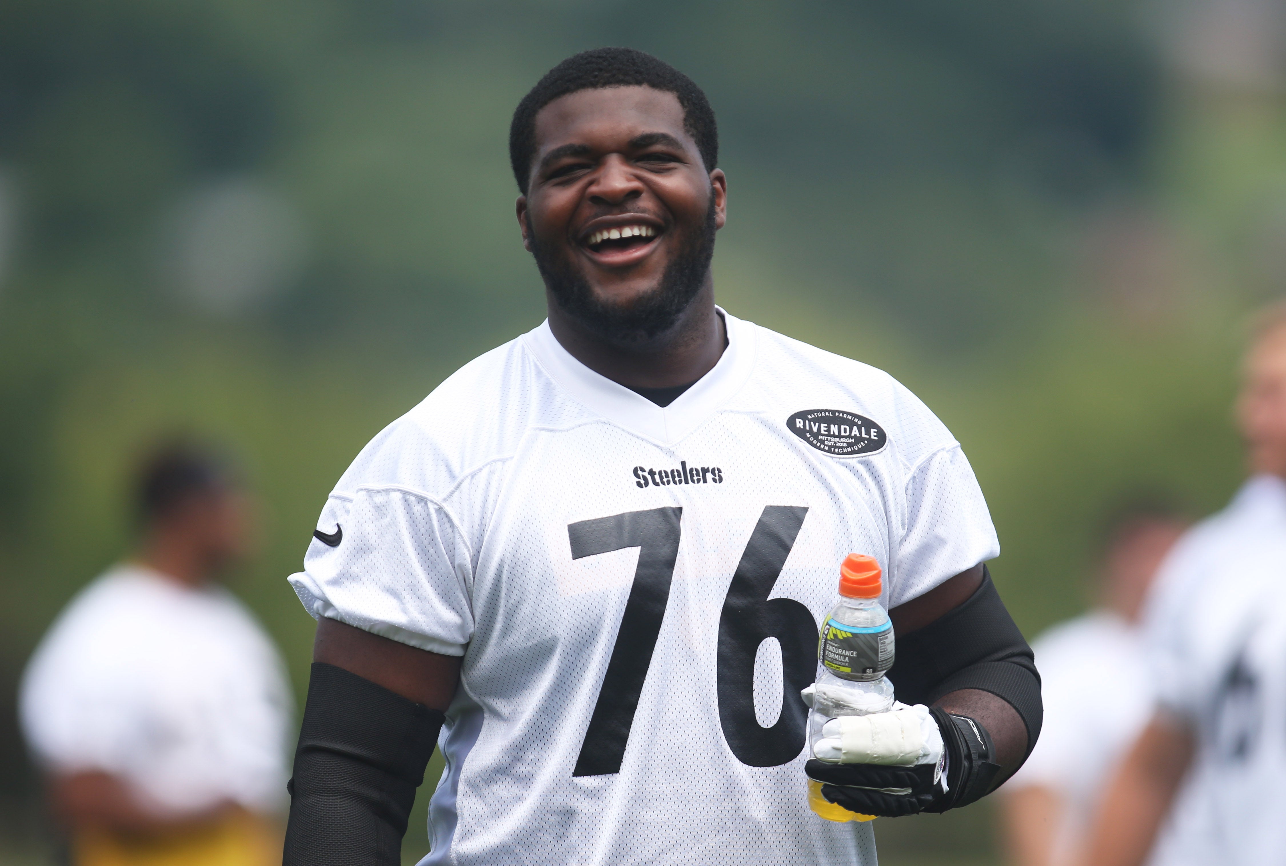 Jul 27, 2019; Latrobe, PA, USA; Pittsburgh Steelers offensive tackle Chukwuma Okorafor (76) smiles during a break in drills during training camp at Saint Vincent College