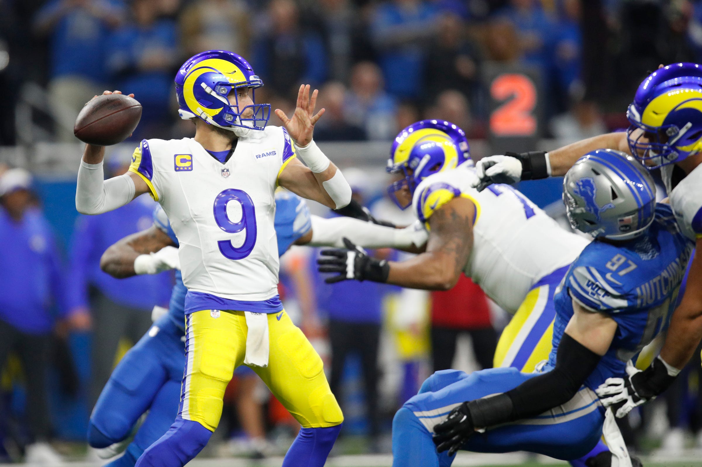 L.A. Rams quarterback Matthew Stafford looks to throw the ball in the first half against the Detroit Lions at Ford Field in Detroit on Sunday, Jan. 14, 2024.