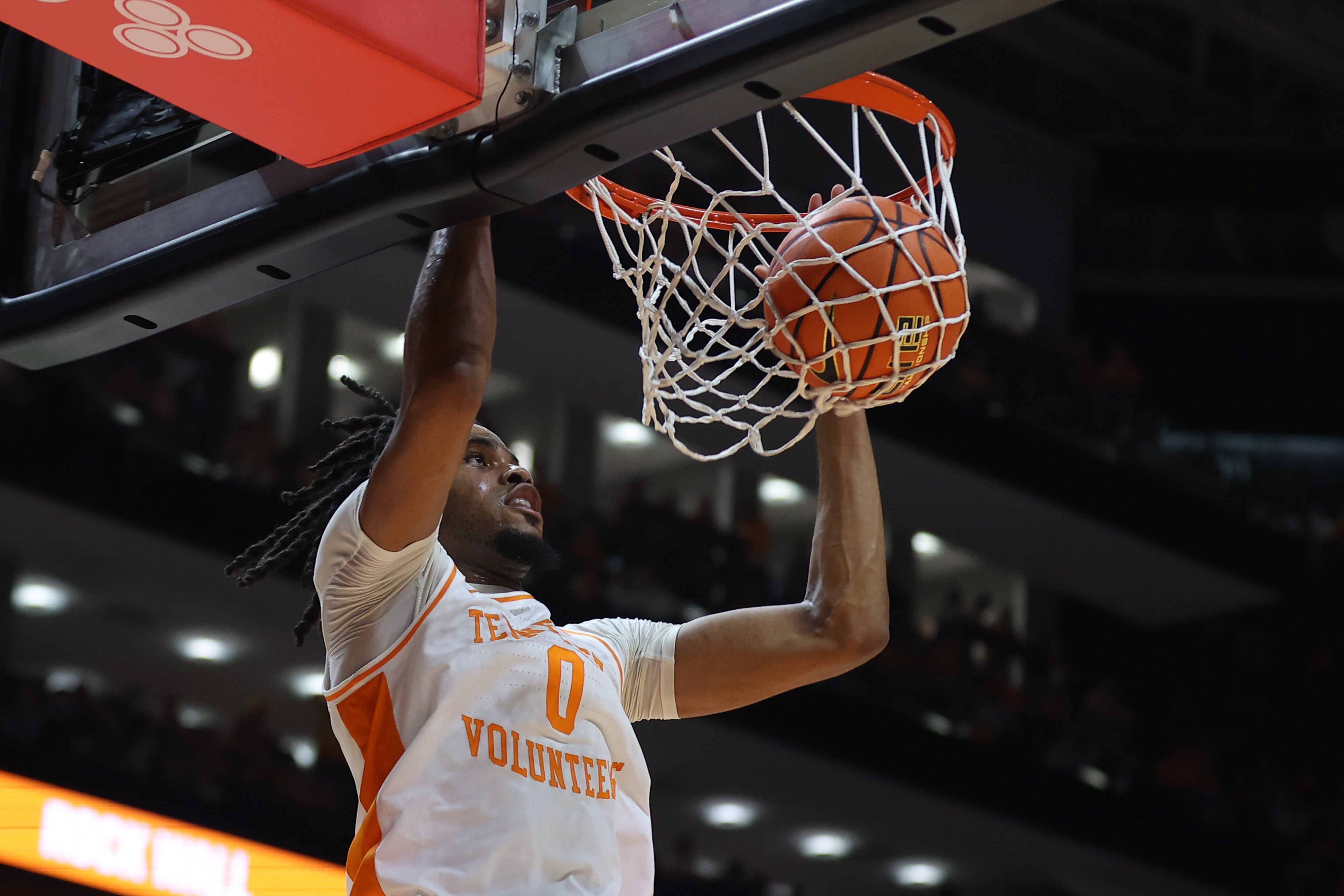 Caption: Mar 9, 2024; Knoxville, Tennessee, USA; Tennessee Volunteers forward Jonas Aidoo (0) dunks the ball against the Kentucky Wildcats during the second half at Thompson-Boling Arena at Food City Center.