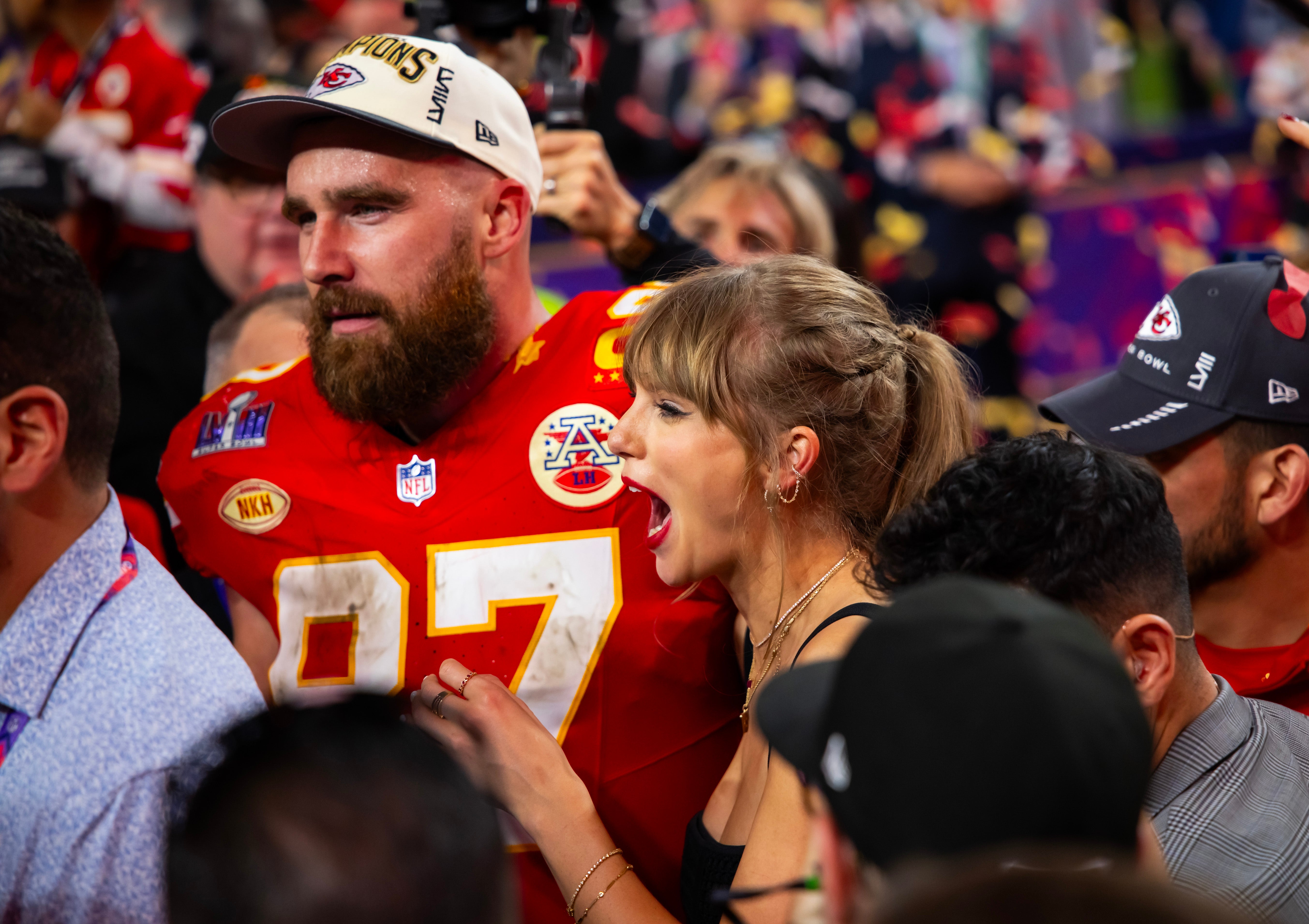 Feb 11, 2024; Paradise, Nevada, USA; Kansas City Chiefs tight end Travis Kelce (87) celebrates with girlfriend Taylor Swift after defeating the San Francisco 49ers in Super Bowl LVIII at Allegiant Stadium.