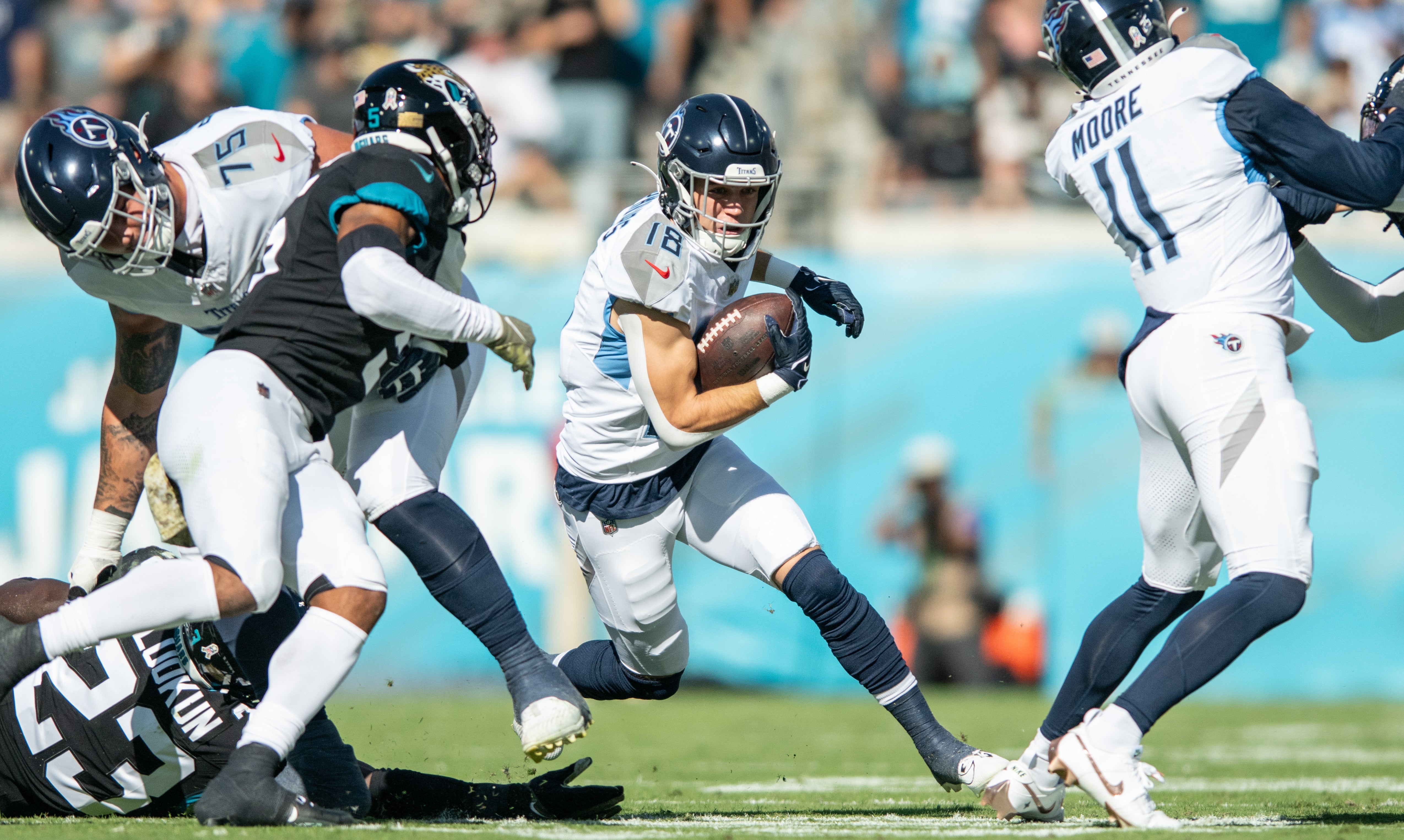 Tennessee Titans wide receiver Kyle Philips (18) runs the ball after the catch against the Jacksonville Jaguars in the second quarter at EverBank Stadium. Jeremy Reper-USA TODAY Sports