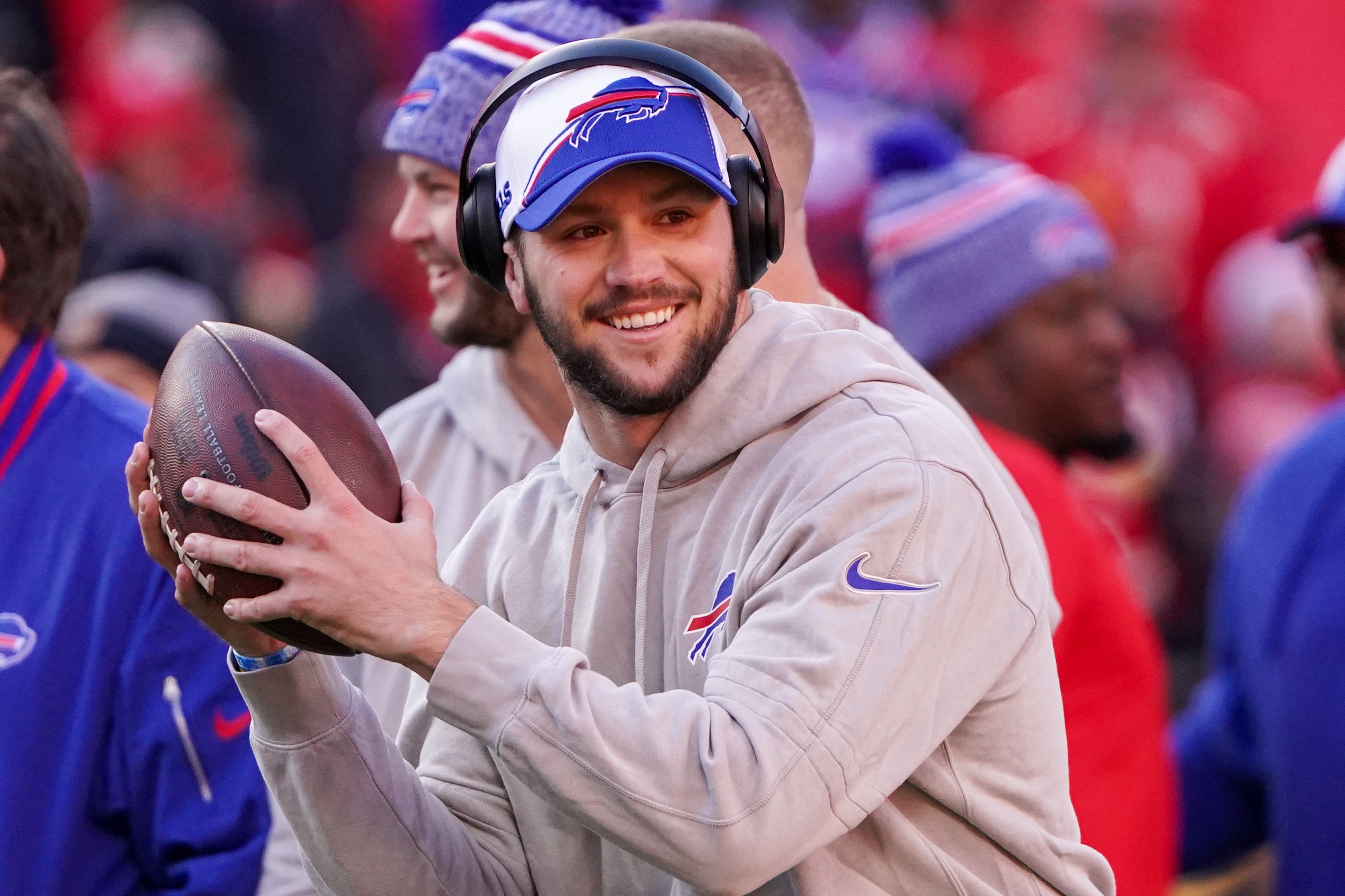 Dec 10, 2023; Kansas City, Missouri, USA; Buffalo Bills quarterback Josh Allen (17) smiles toward the sidelines against the Kansas City Chiefs prior to a game at GEHA Field at Arrowhead Stadium.
