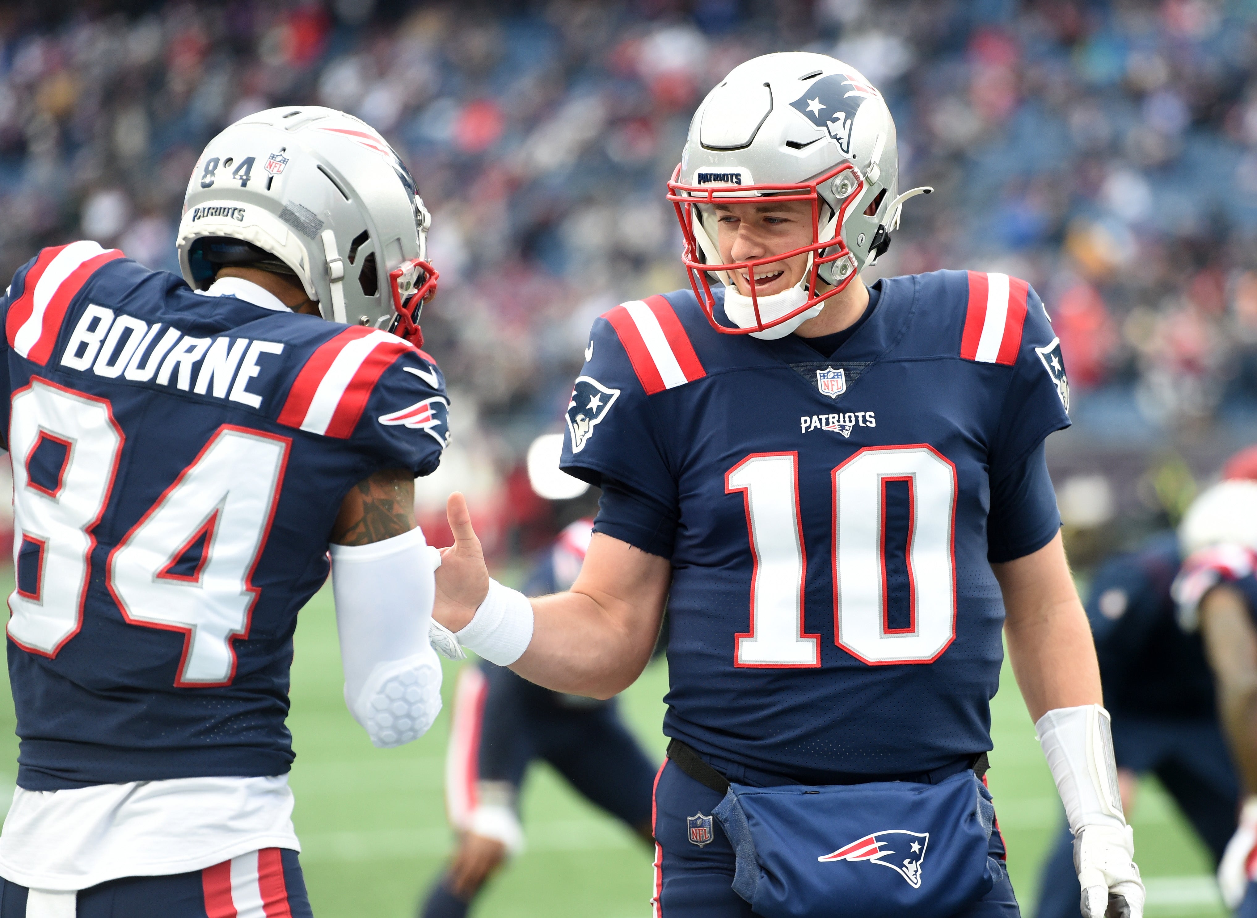 Dec 26, 2021; Foxborough, Massachusetts, USA; New England Patriots wide receiver Kendrick Bourne (84) and quarterback Mac Jones (10) prior to a game against the Buffalo Bills at Gillette Stadium.