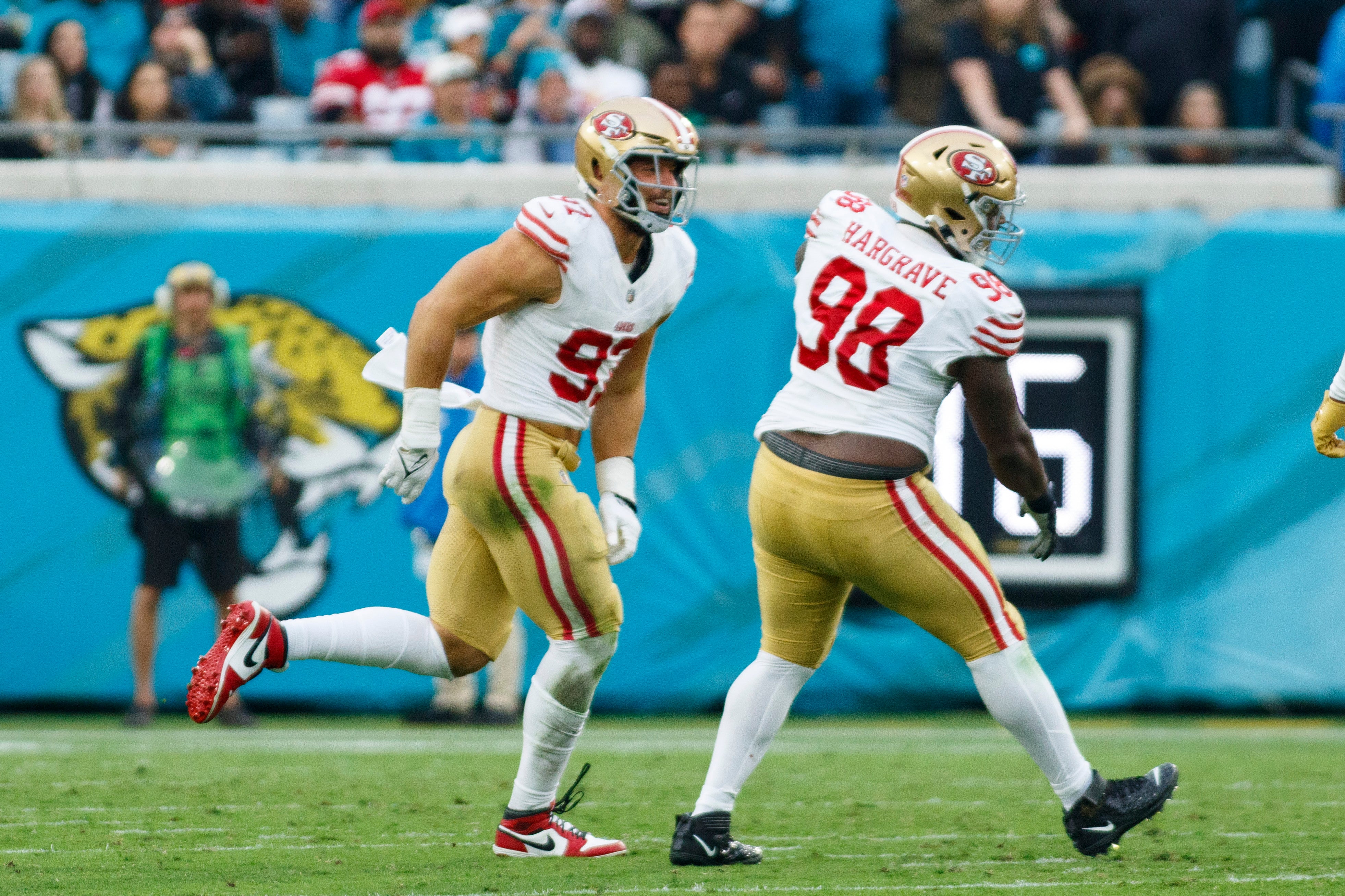 Nov 12, 2023; Jacksonville, Florida, USA; San Francisco 49ers defensive tackle Nick Bosa (97) and defensive tackle Javon Hargrave (98) celebrate a sack against Jacksonville Jaguars during the third quarter at EverBank Stadium.