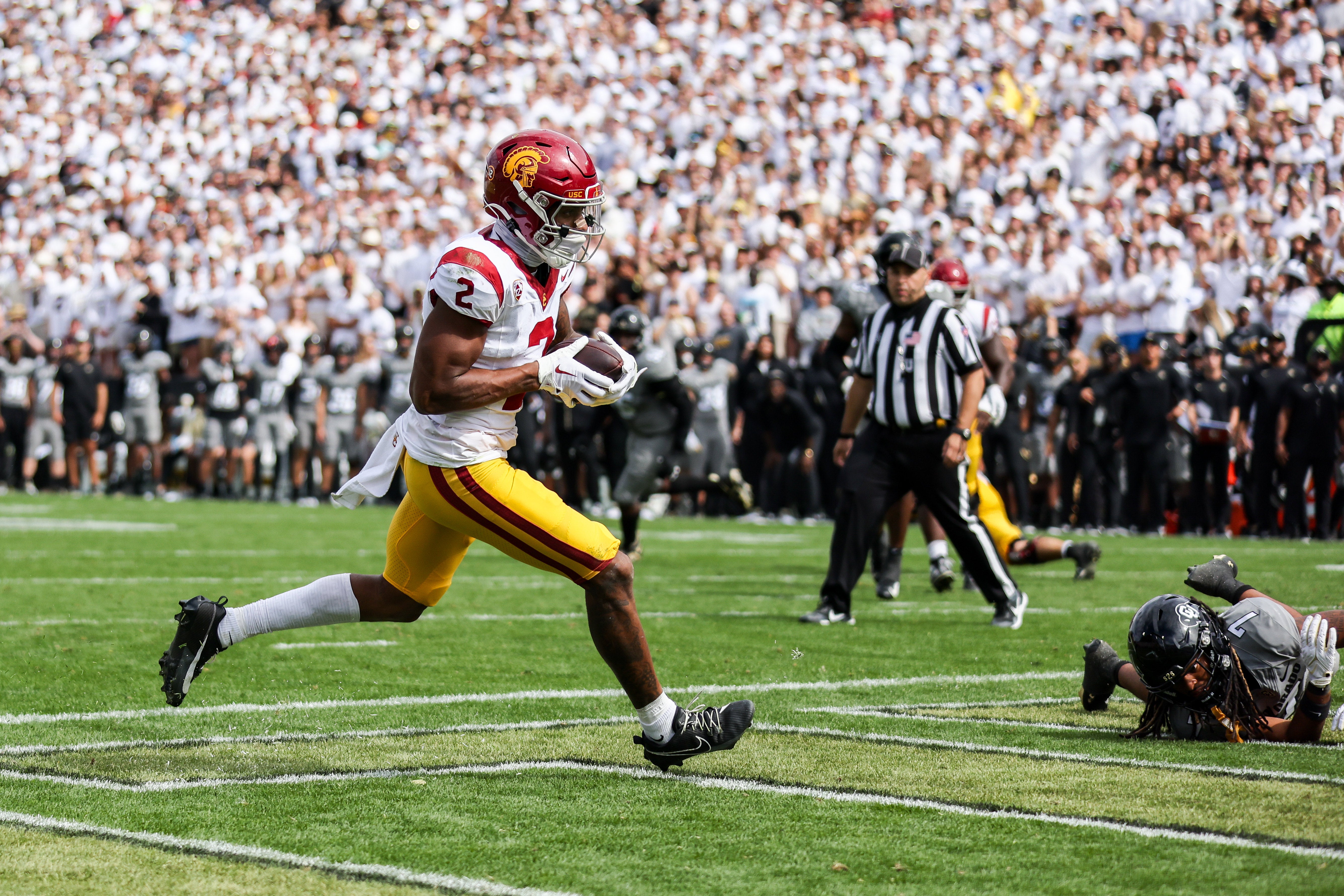 Sep 30, 2023; Boulder, Colorado, USA; USC Trojans wide receiver Brenden Rice (2) runs for a touchdown in the third quarter against the Colorado Buffaloes at Folsom Field.