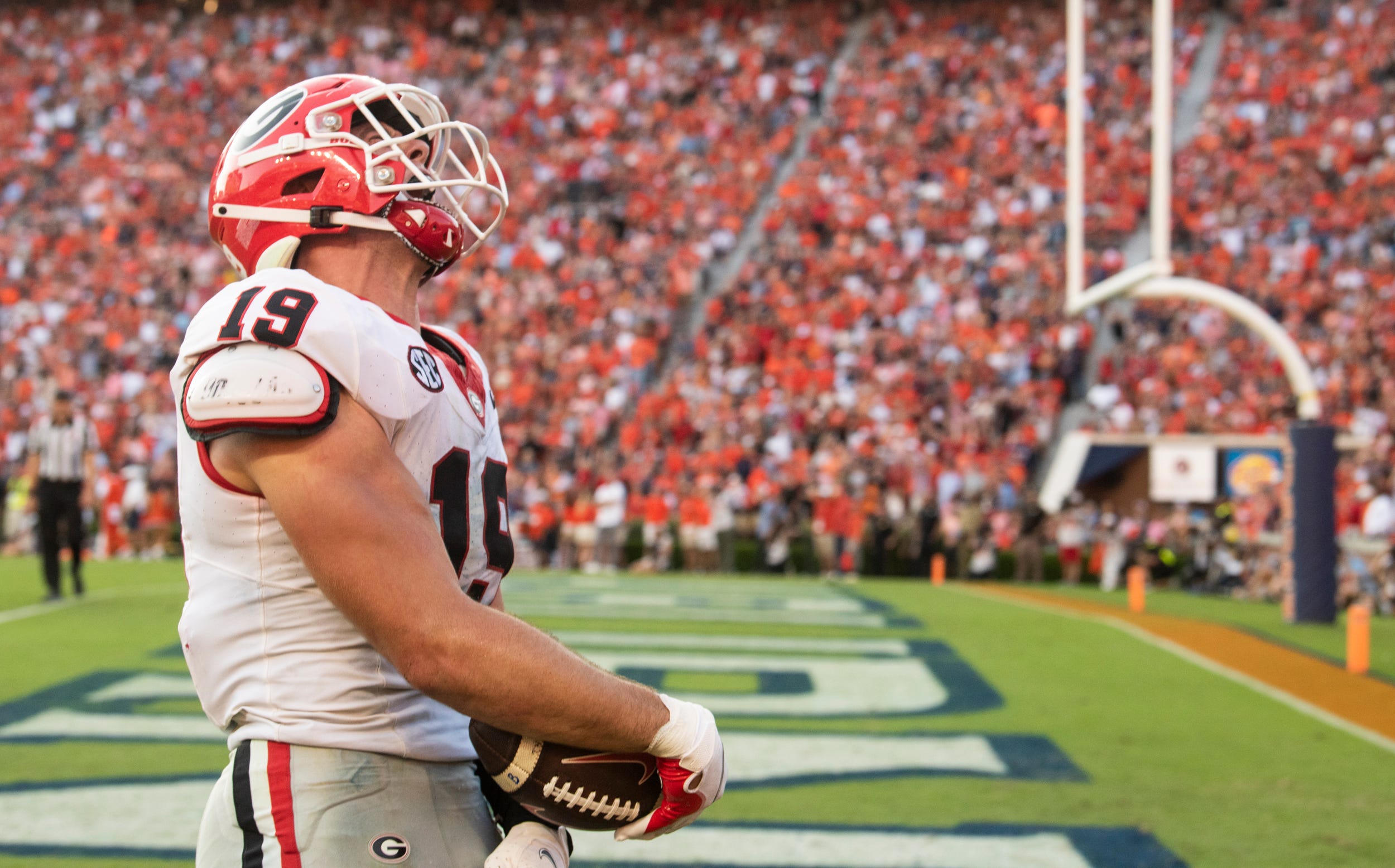 Georgia Bulldogs tight end Brock Bowers (19) celebrates his game sealing touchdown catch as Auburn Tigers take on Georgia Bulldogs at Jordan-Hare Stadium in Auburn, Ala., on Saturday, Sept. 30, 2023. Georgia Bulldogs defeated Auburn Tigers 27-20.