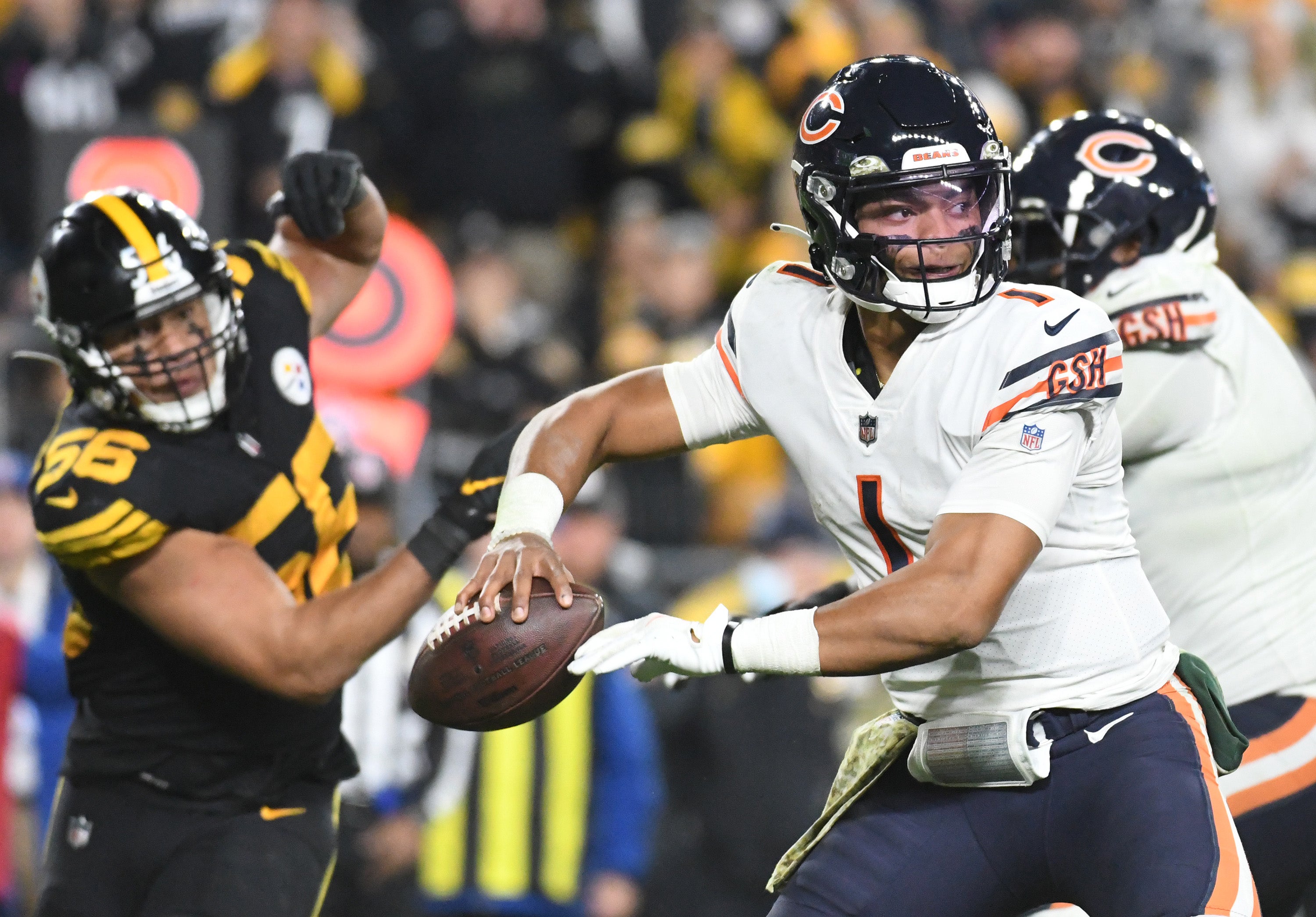 Nov 8, 2021; Pittsburgh, Pennsylvania, USA; Chicago Bears quarterback Justin Fields (1) throws a fourth quarter pass under pressure from Pittsburgh Steelers linebacker Alex Highsmith (56) at Heinz Field. The Steelers won 29-27. Mandatory Credit: Philip G. Pavely-USA TODAY Sports