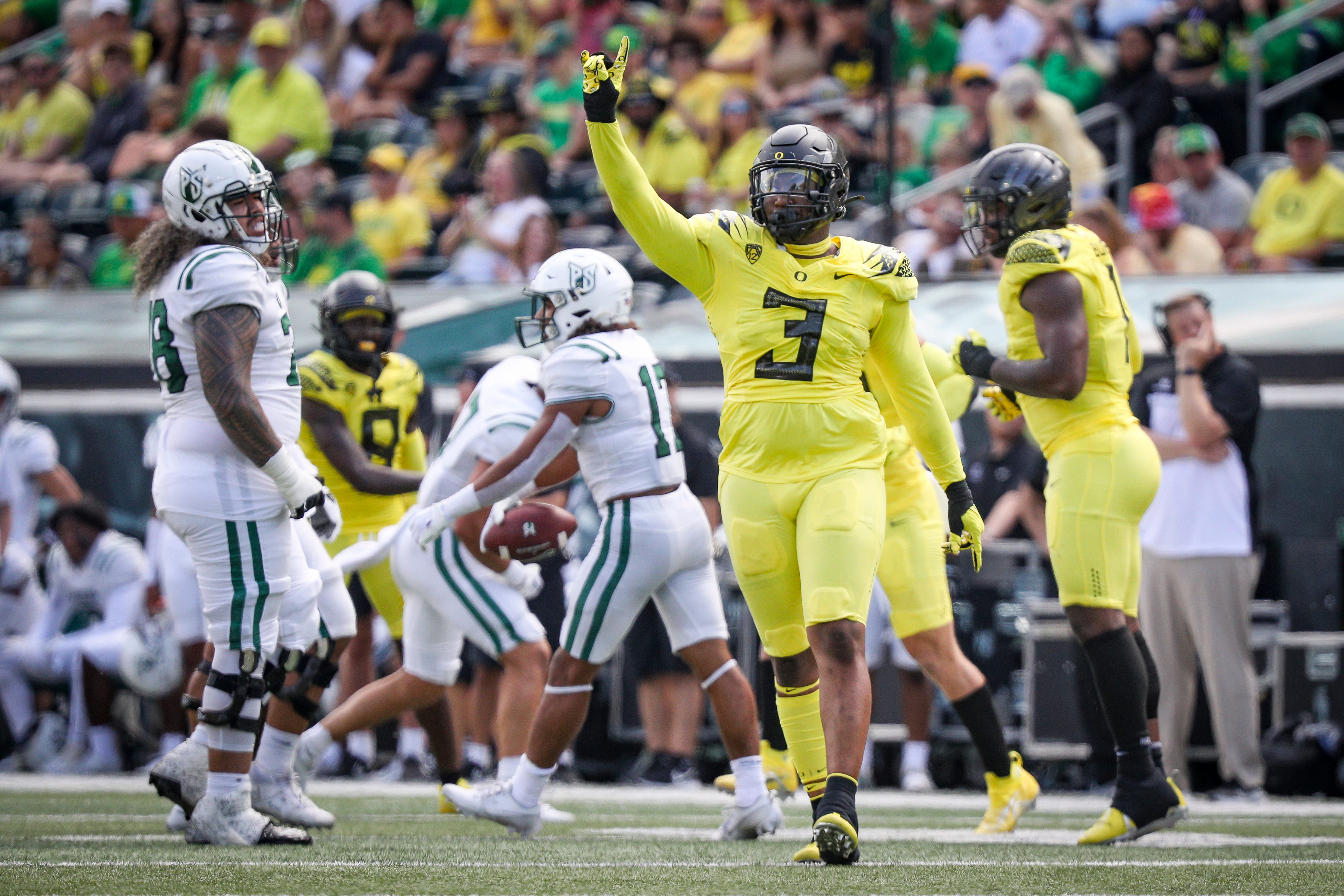 Oregon defensive end Brandon Dorlus celebrates a stop as the Oregon Ducks host Portland State in the Ducks season opener Saturday, Sept. 2, 2023, at Autzen Stadium in Eugene, Ore.