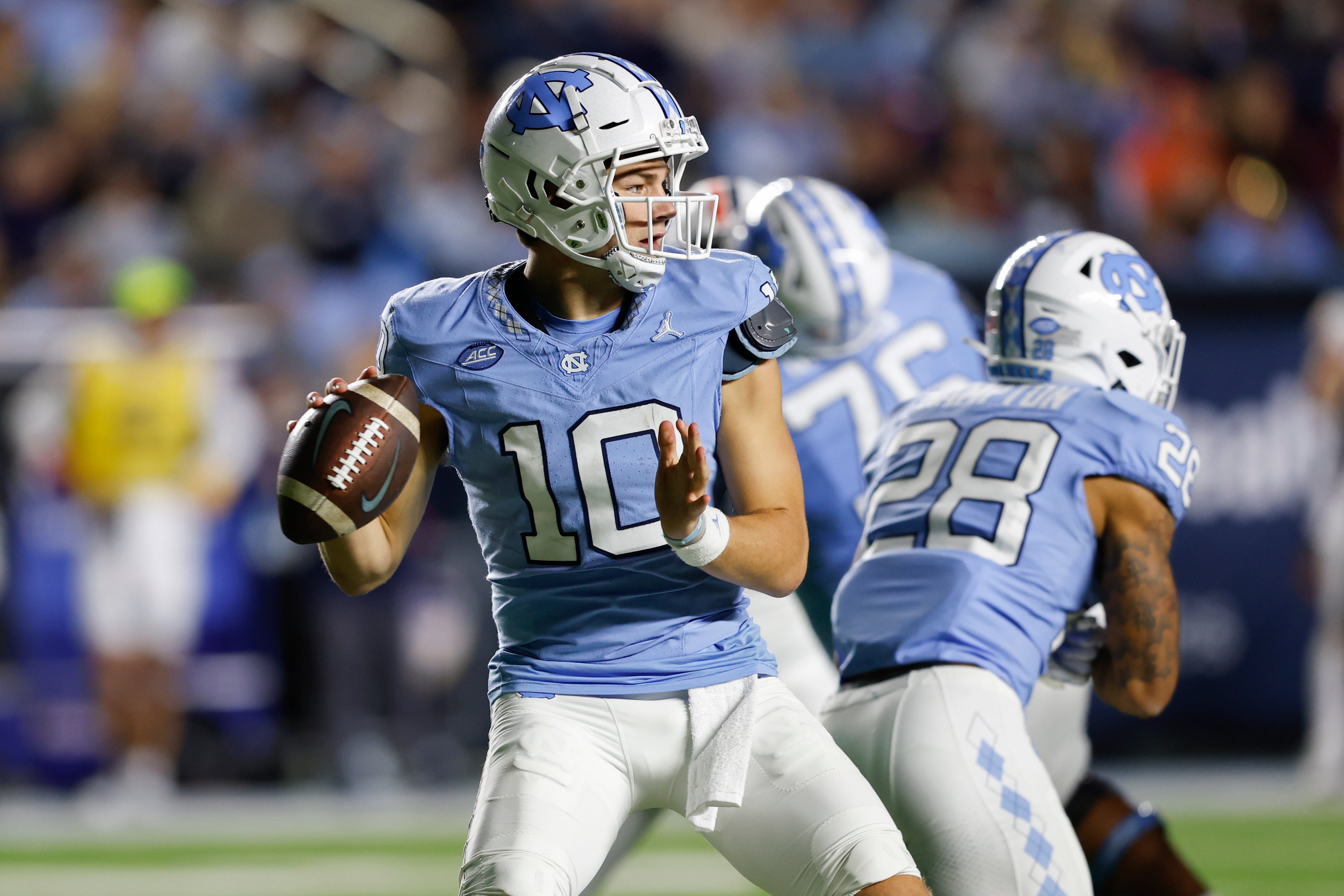 Oct 21, 2023; Chapel Hill, North Carolina, USA; North Carolina Tar Heels quarterback Drake Maye (10) looks to pass against the Virginia Cavaliers in the second half at Kenan Memorial Stadium