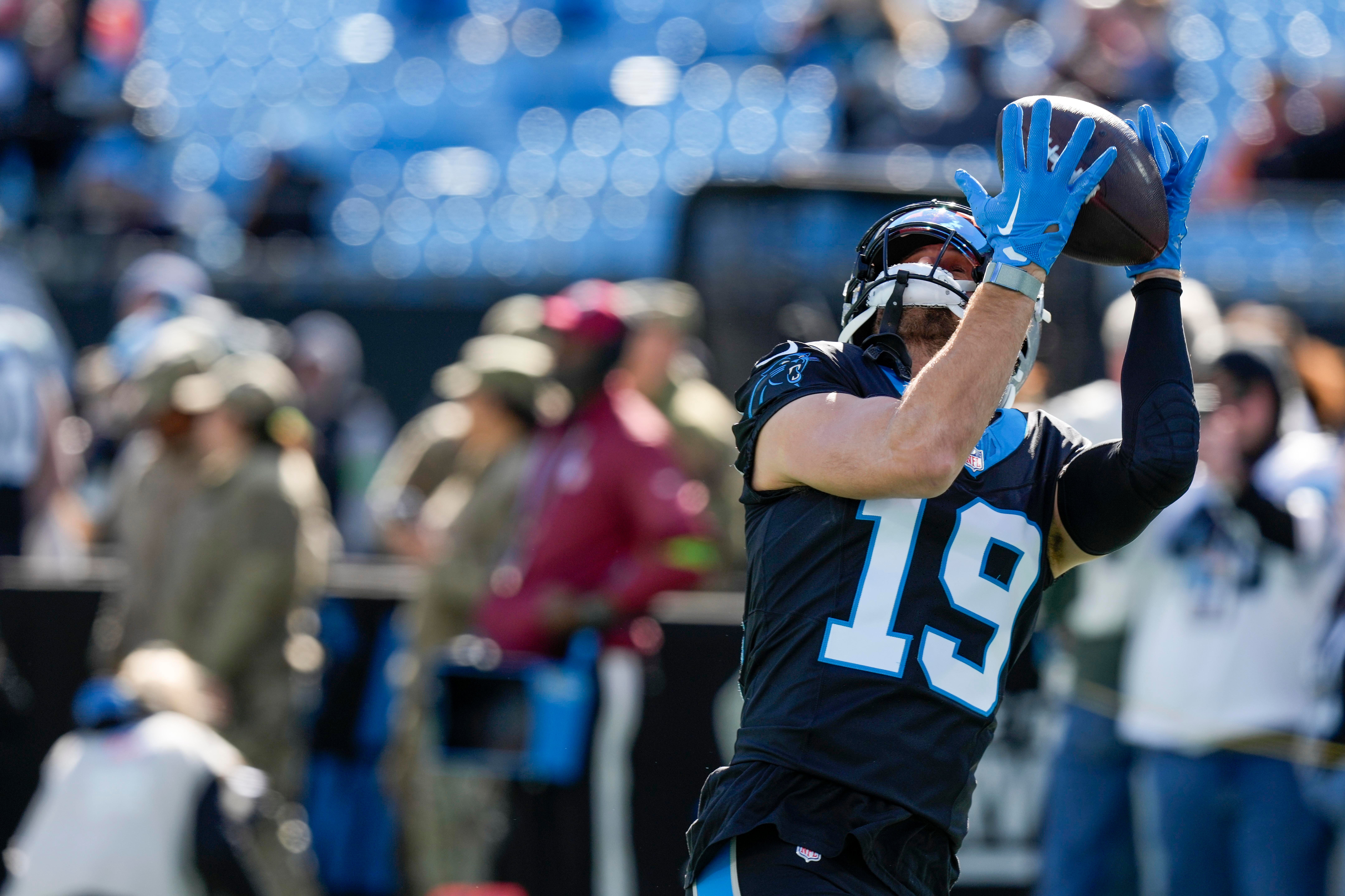 Jan 7, 2024; Charlotte, North Carolina, USA; Carolina Panthers wide receiver Adam Thielen (19) makes a catch during pregame warm ups against the Tampa Bay Buccaneers at Bank of America Stadium. Mandatory Credit: Jim Dedmon-USA TODAY Sports