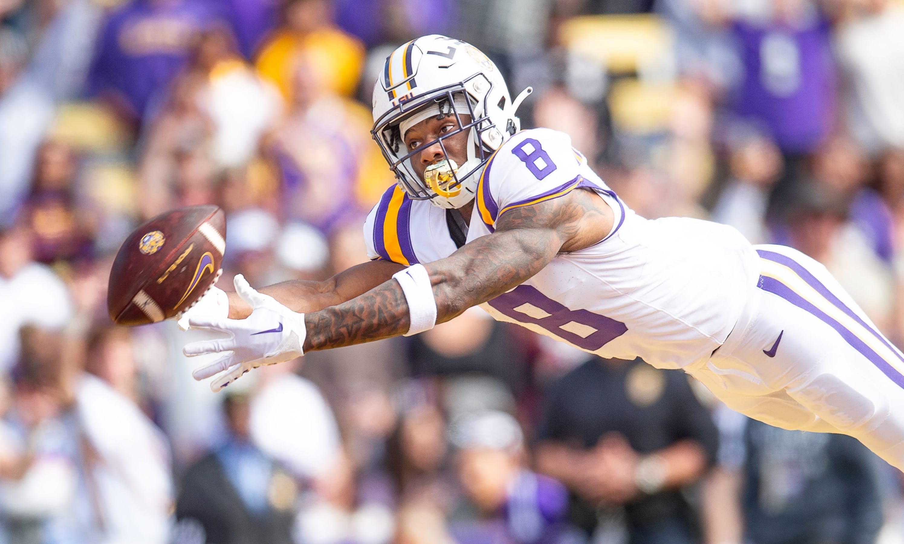 Malik Nabers 8 dives for a ball as the LSU Tigers take on Texas A&M in Tiger Stadium in Baton Rouge, Louisiana, November 25, 2023 SCOTT CLAUSE/USA TODAY Network-USA TODAY NETWORK