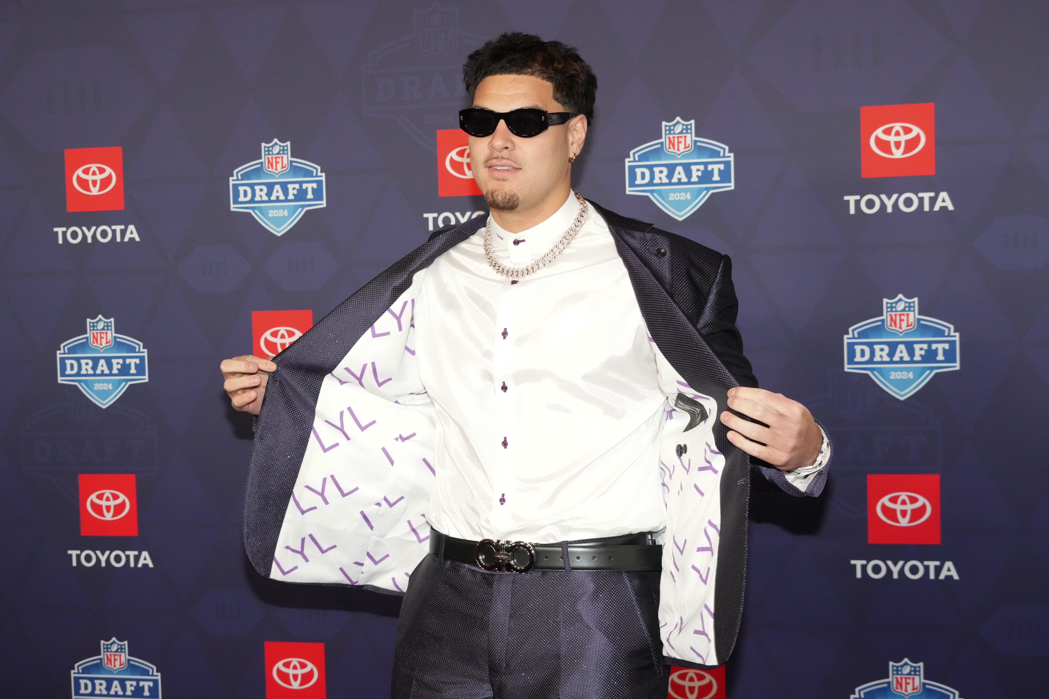 Apr 25, 2024; Detroit, MI, USA; UCLA Bruins defensive lineman Laiatu Latu stands on the red carpet ahead of the 2024 NFL Draft at Detroit’s Fox Theatre.