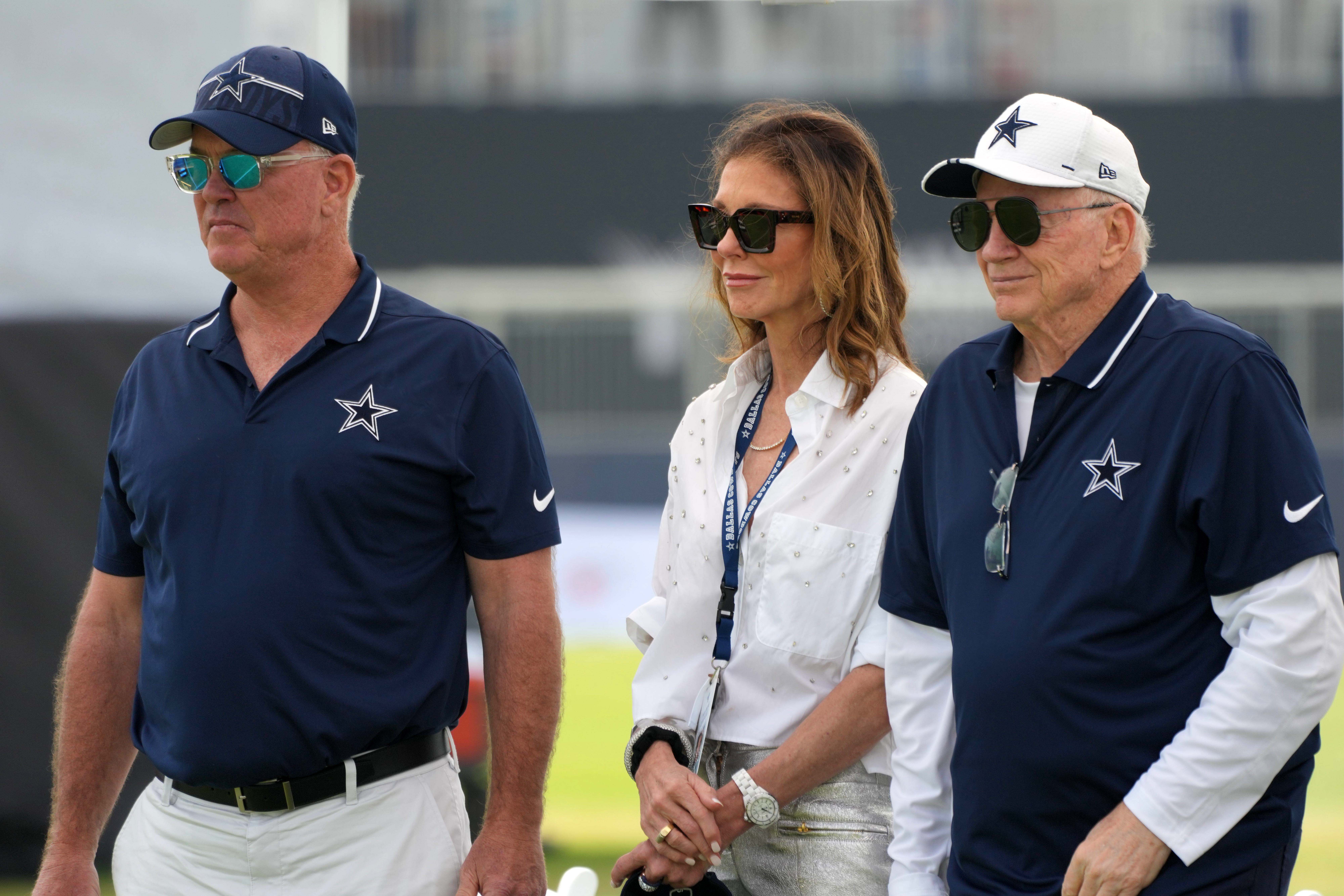 Dallas Cowboys chief operating officer Stephen Jones (left), chief brand officer Charlotte Jones (center) and owner Jerry Jones during training camp opening ceremonies at the River Ridge Fields.