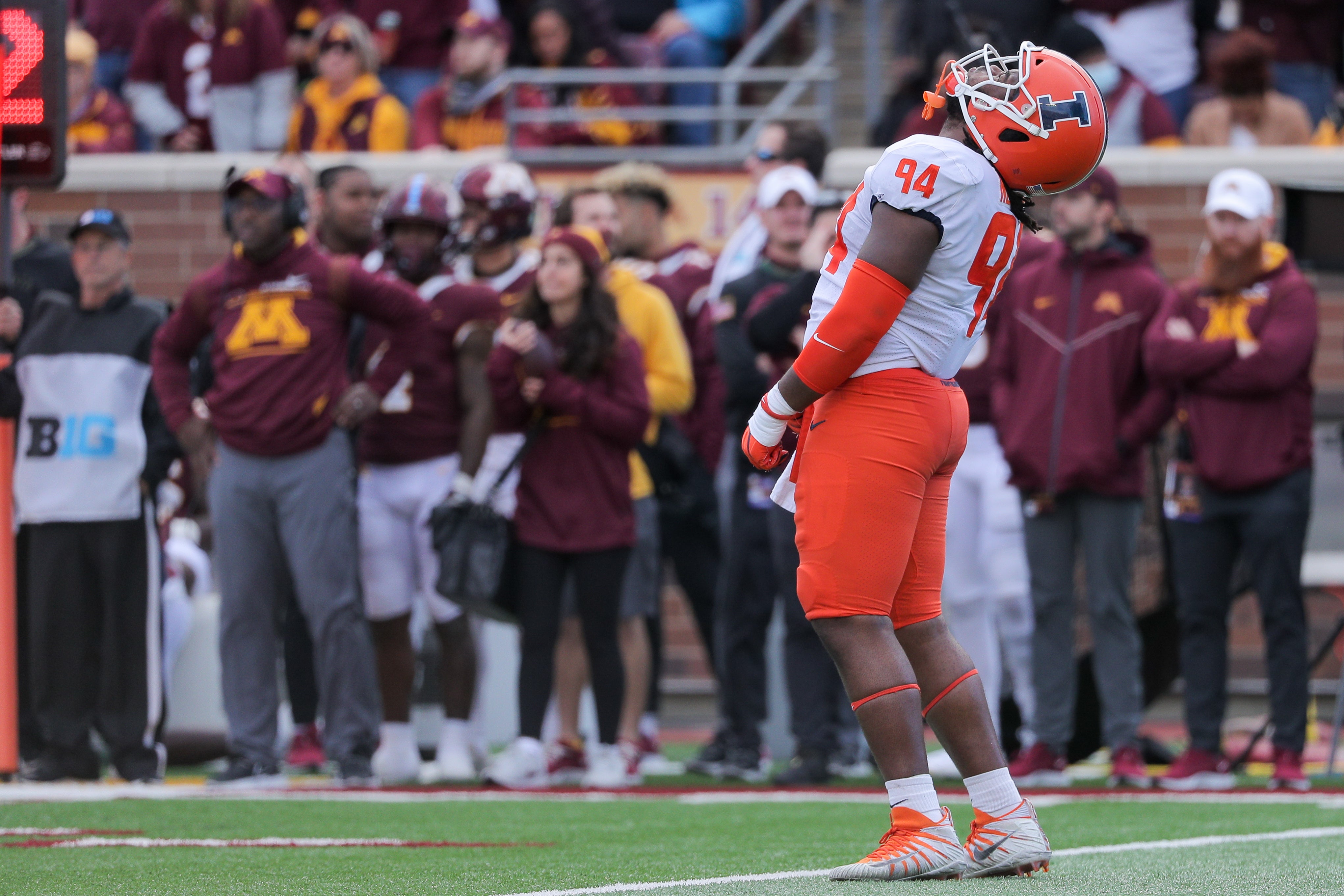Nov 6, 2021; Minneapolis, Minnesota, USA; Illinois Fighting Illini defensive lineman Jer'Zhan Newton (94) reacts to a missed stop in the third quarter at Huntington Bank Stadium.