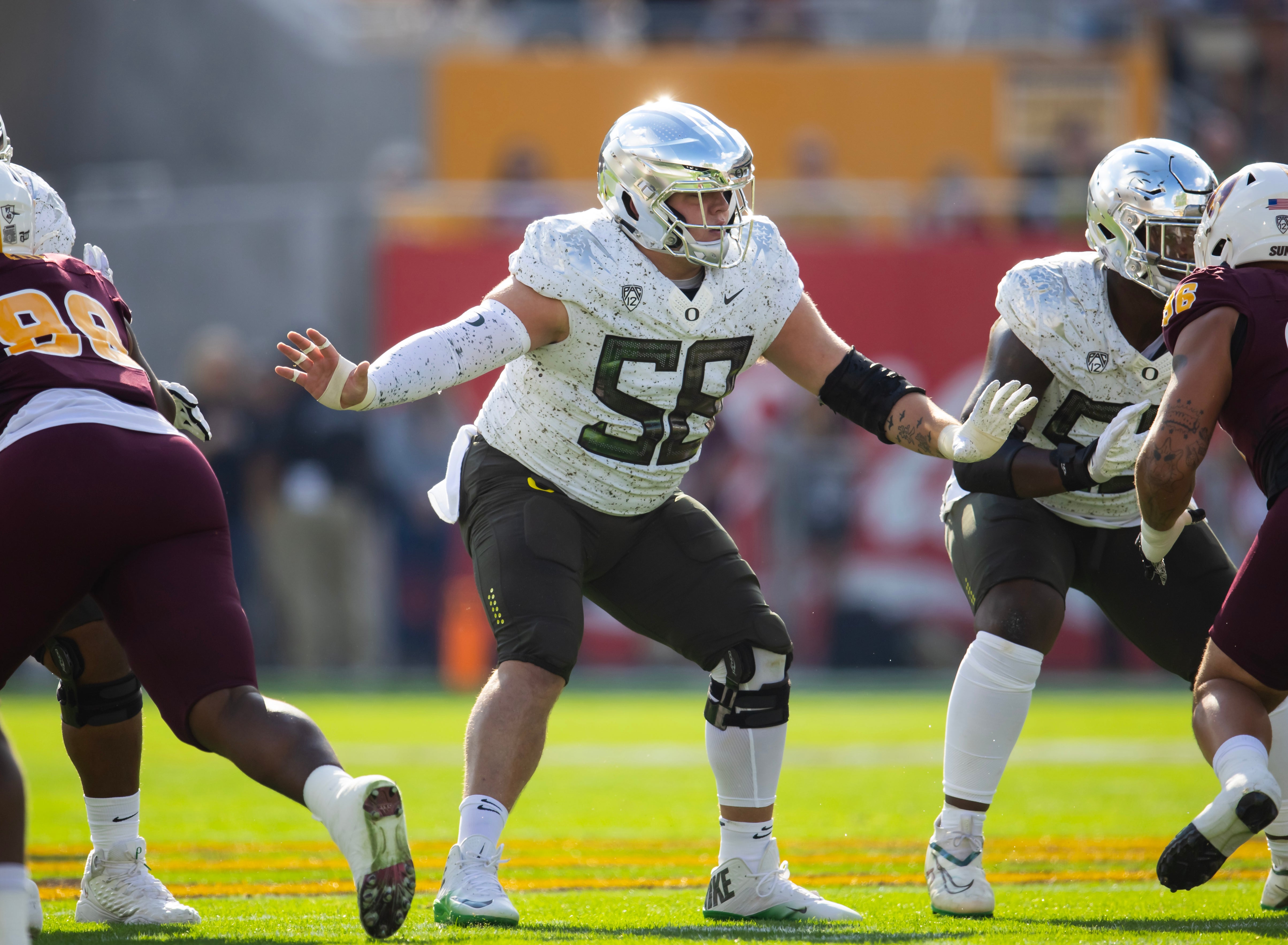 Nov 18, 2023; Tempe, Arizona, USA; Oregon Ducks offensive lineman Jackson Powers-Johnson (58) against the Arizona State Sun Devils at Mountain America Stadium.