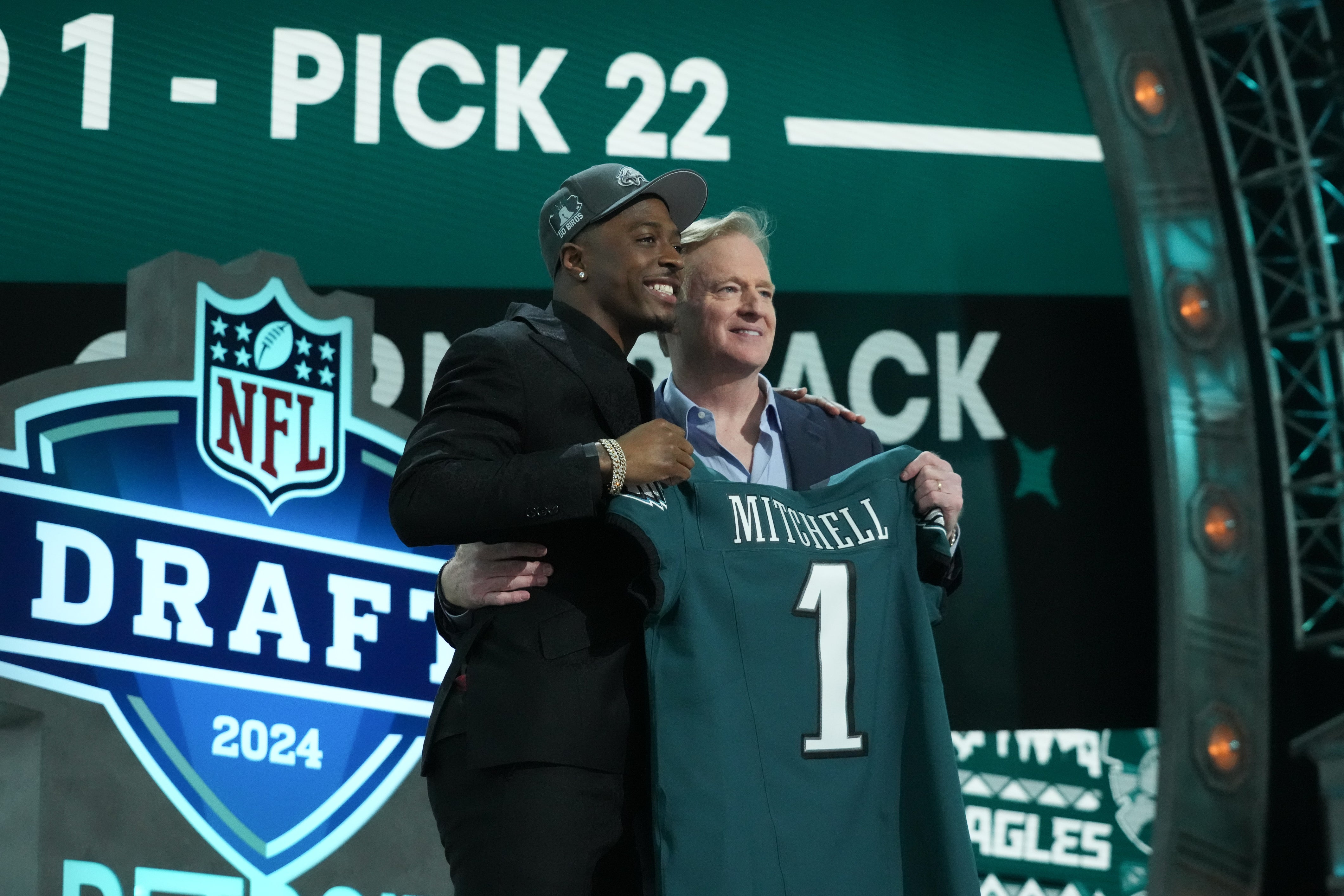 Toledo Rockets cornerback Quinyon Mitchell poses with NFL commissioner Roger Goodell after being selected by the Philadelphia Eagles as the No. 22 pick in the first round of the 2024 NFL Draft at Camp.