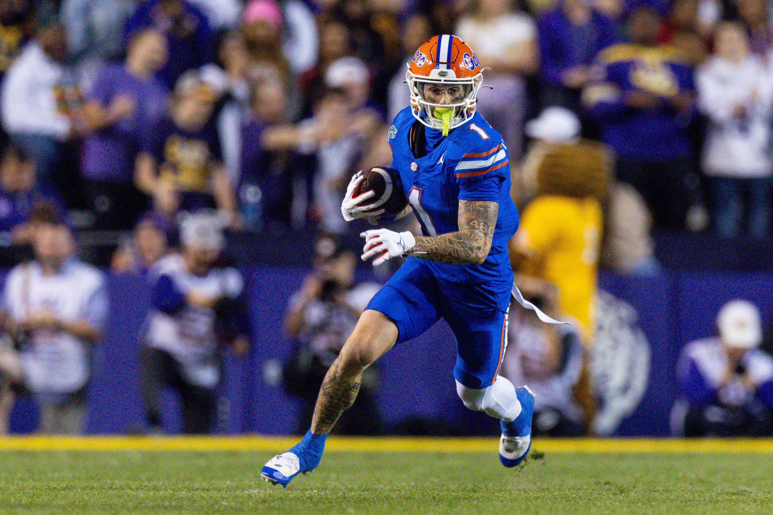 Nov 11, 2023; Baton Rouge, Louisiana, USA; Florida Gators wide receiver Ricky Pearsall (1) catches a pass against the LSU Tigers during the first half at Tiger Stadium.
