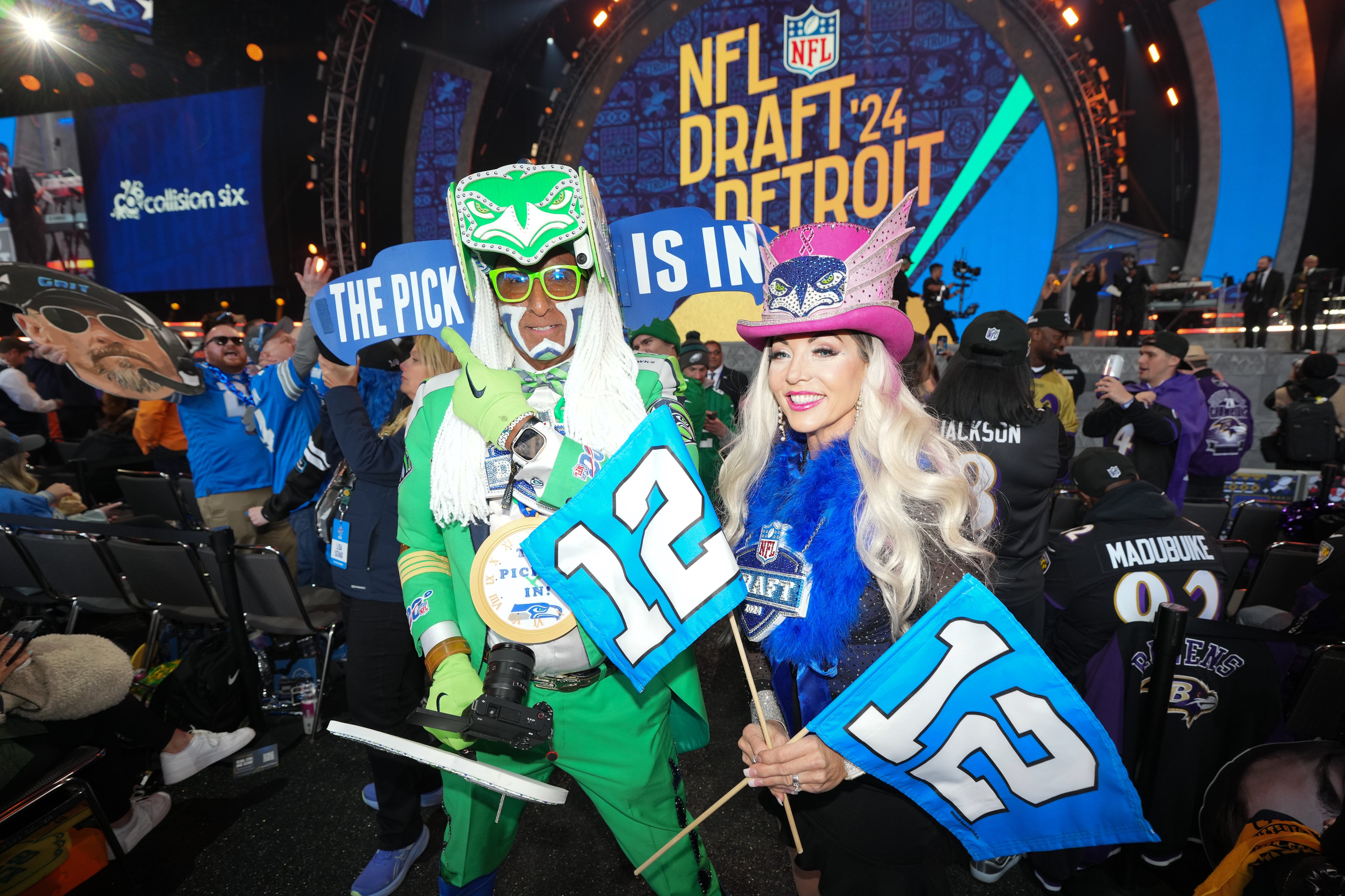 Apr 25, 2024; Detroit, MI, USA; Seattle Seahawks fans pose for a photograph during the 2024 NFL Draft at Campus Martius Park and Hart Plaza.